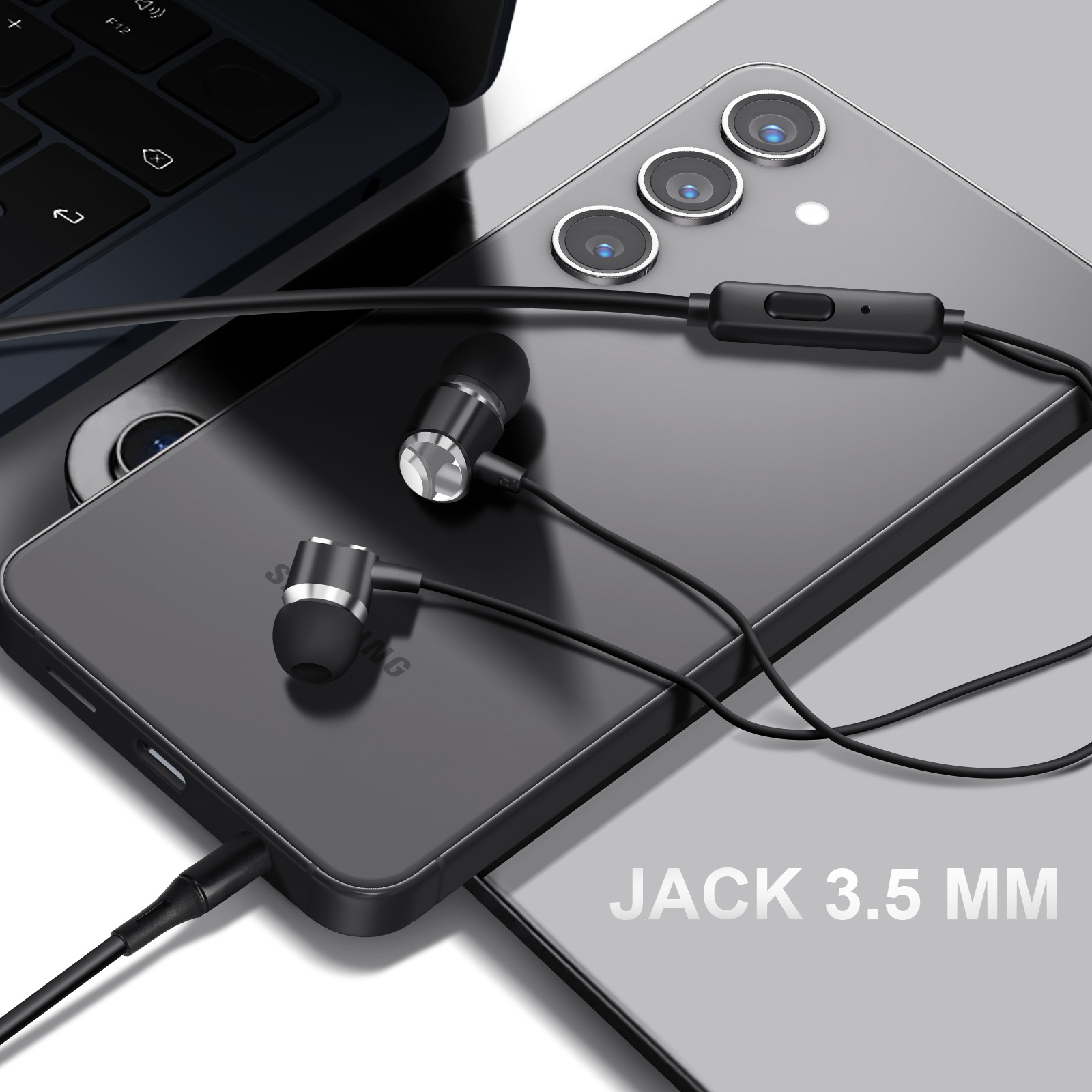 Telefono nero su un laptop, con auricolari collegati e il testo 'JACK 3.5 MM'.