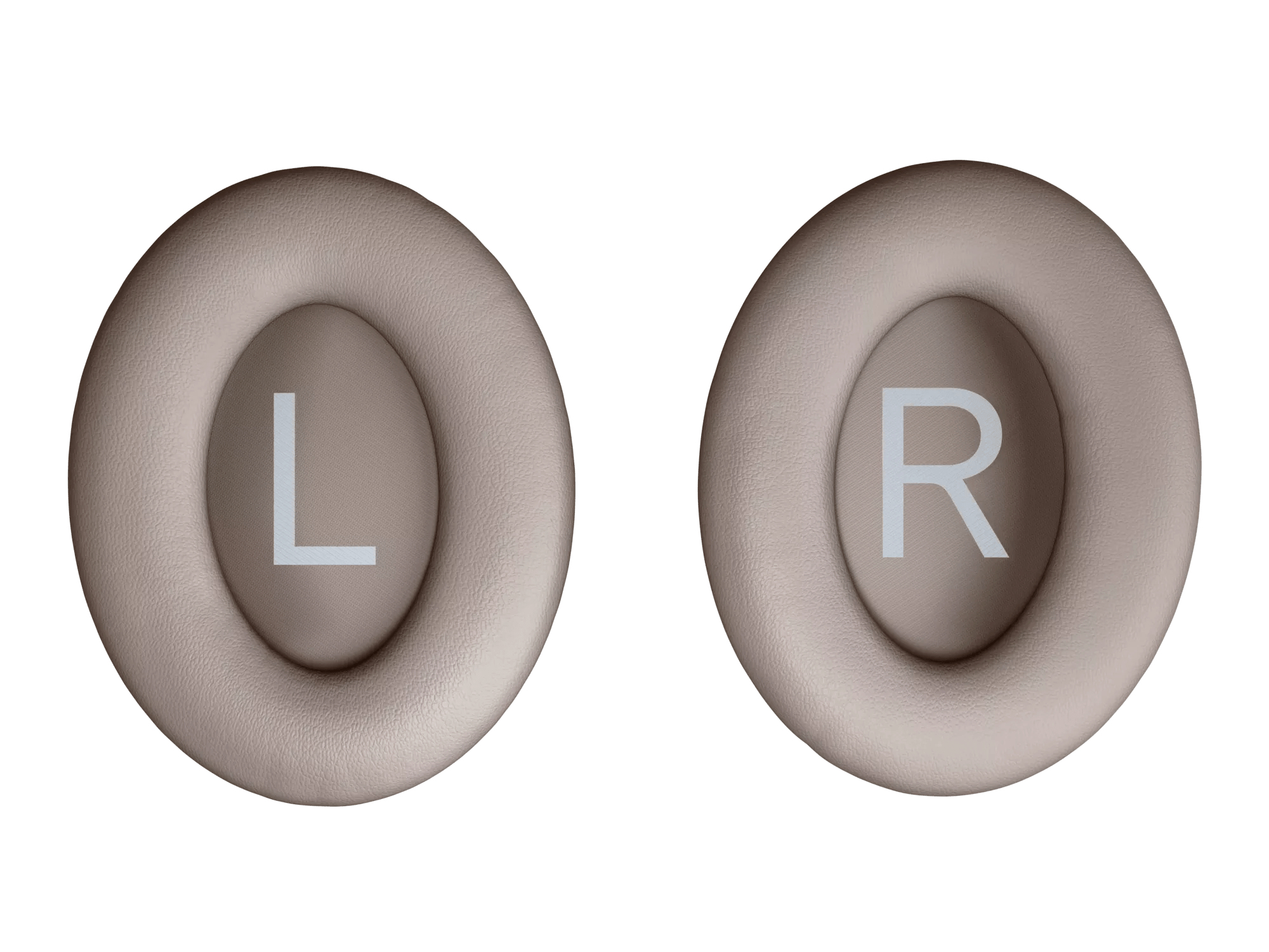 Dwie poduszki na uszy, lewa i prawa, w kolorze beżowym. Litery L i R znajdują się na poduszkach.