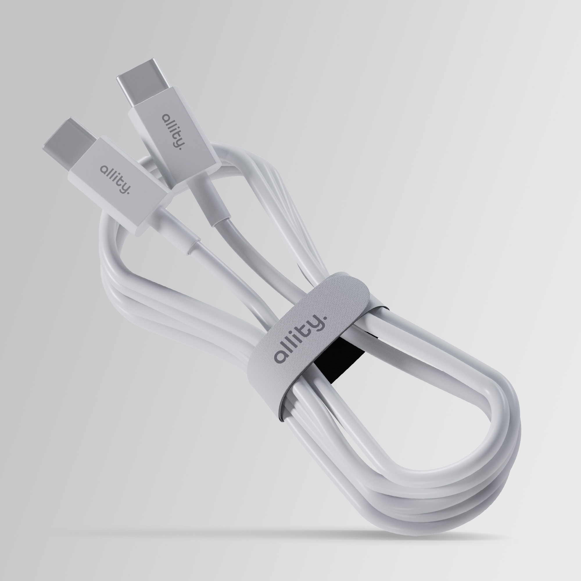 Biały kabel ładujący z dwoma złączami USB-C, trzymany razem paskiem, na jasnym tle.