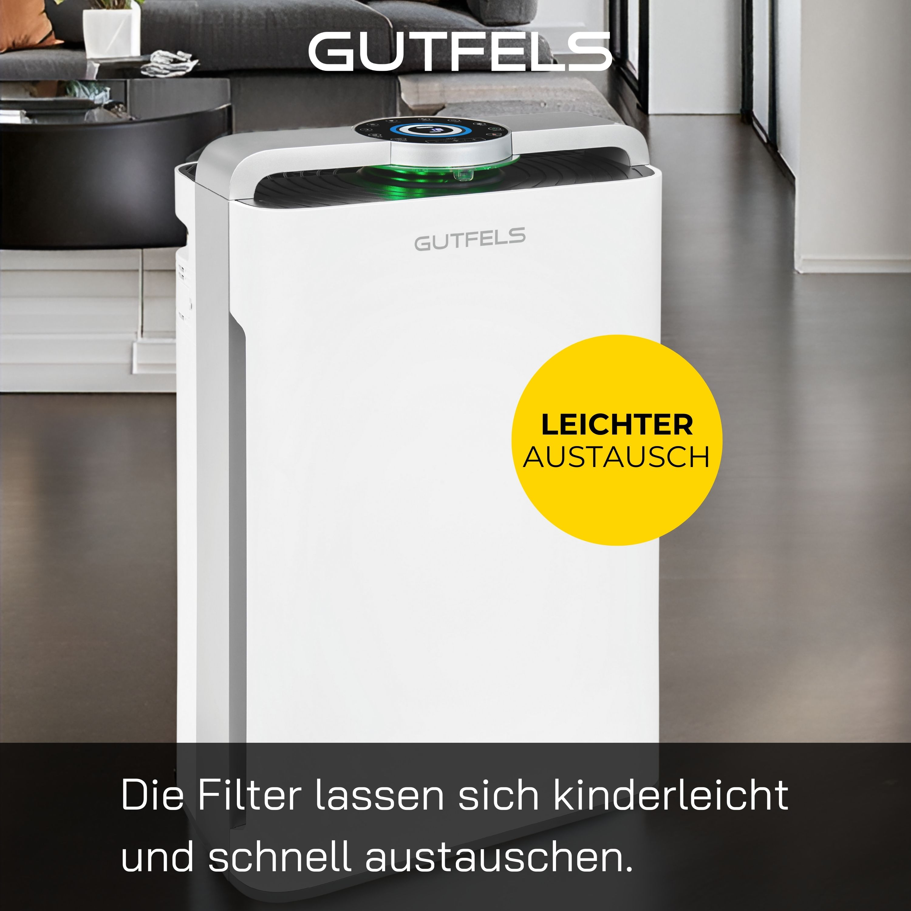 Weißer Luftreiniger mit gelbem Kreis, der den einfachen Filterwechsel anzeigt. Marke Gutfels.