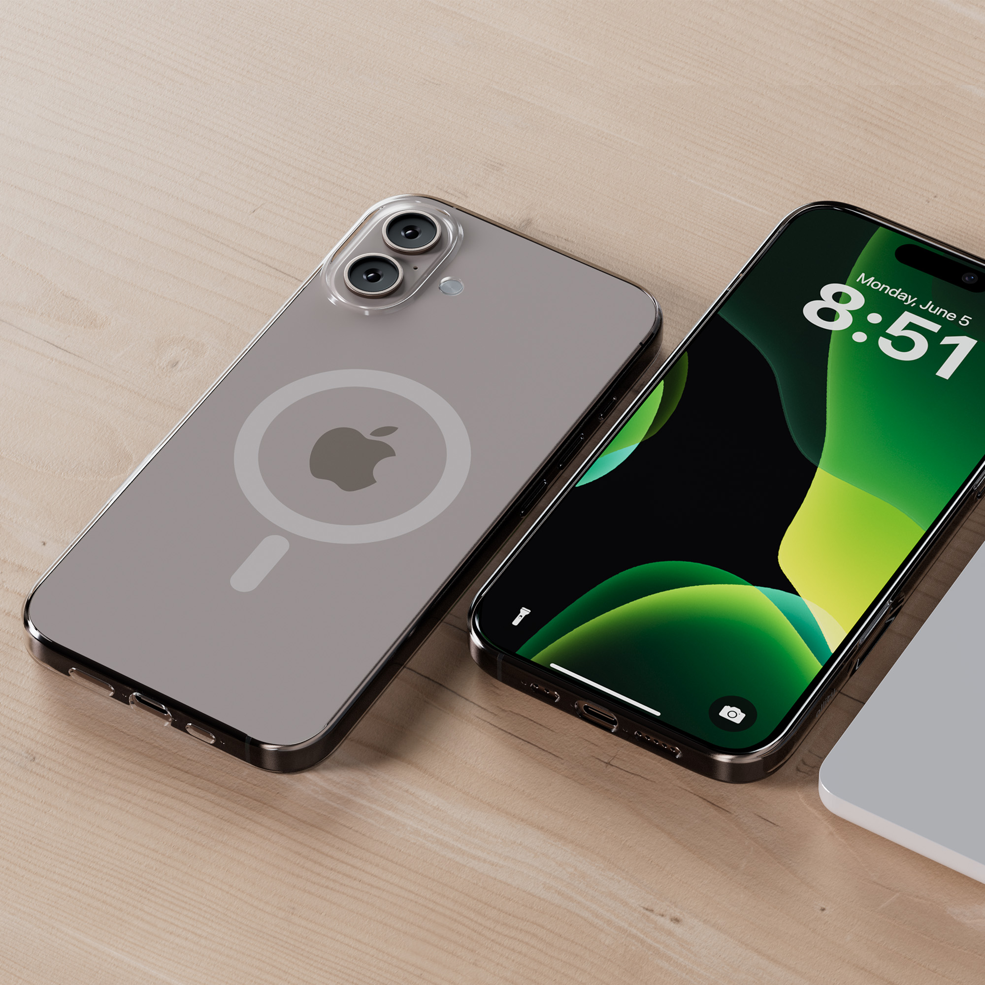 Dwa smartfony, jeden srebrny z logo Apple, drugi czarny. Czarny wyświetla godzinę: 8:51.
