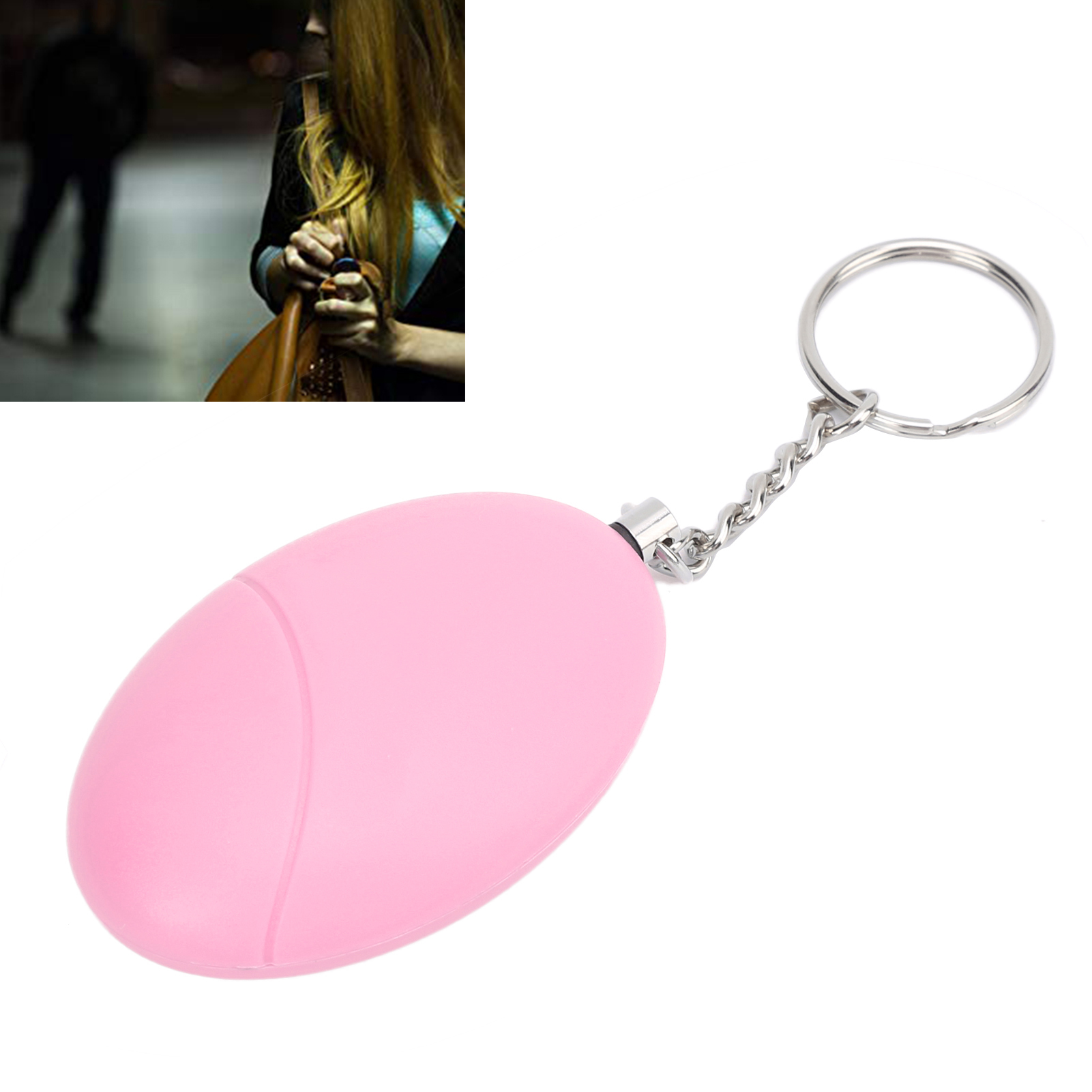 Rosa persönlicher Alarm-Schlüsselanhänger, Frau im Hintergrund.