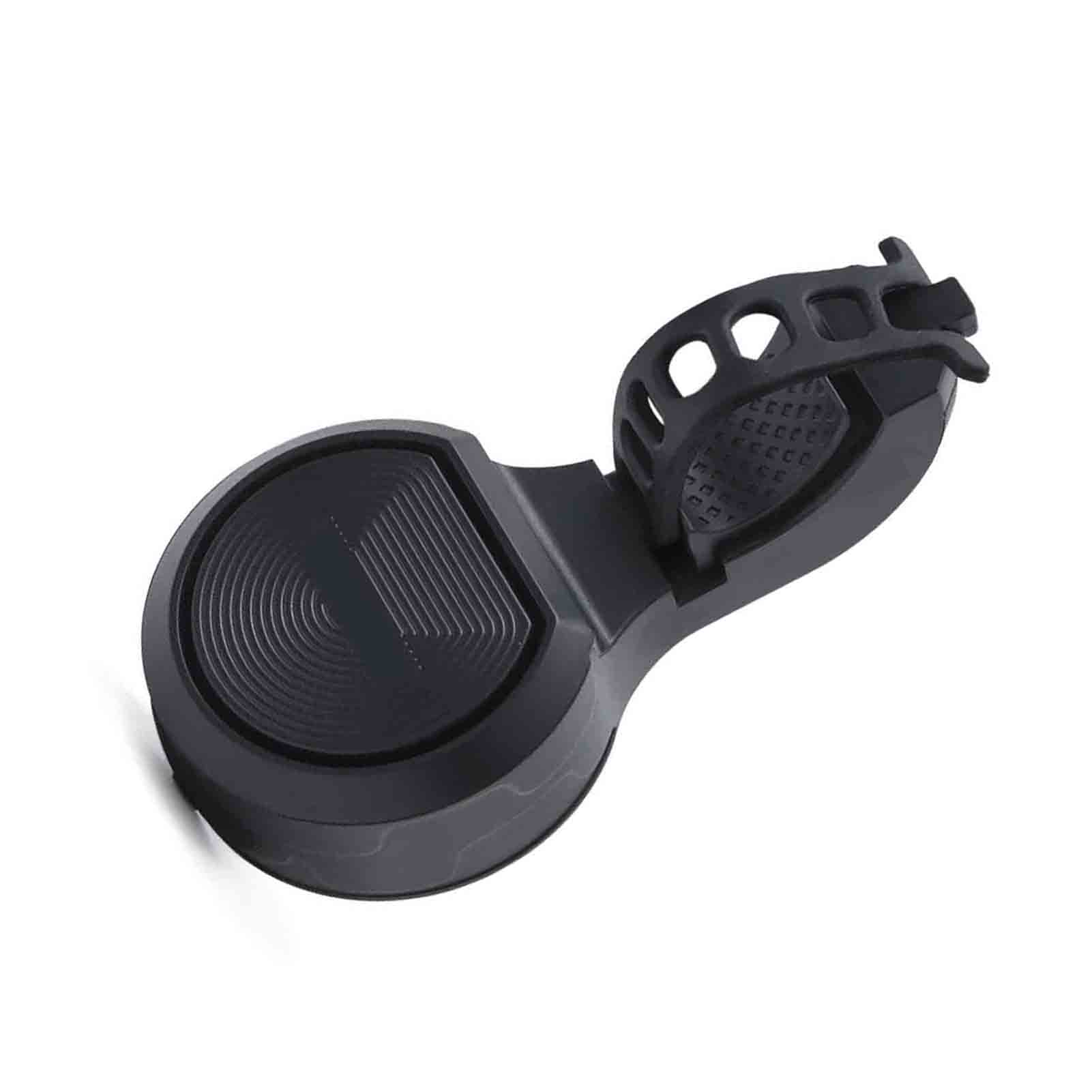 Schwarze Kabelrolle mit kreisförmigem Design auf weißem Hintergrund.