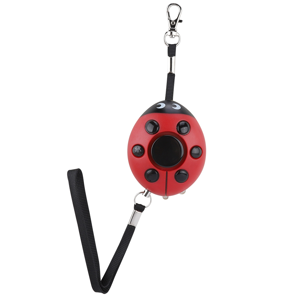 Ein roter Marienkäfer-förmiger persönlicher Alarm mit Handschlaufe und Metallverschluss.