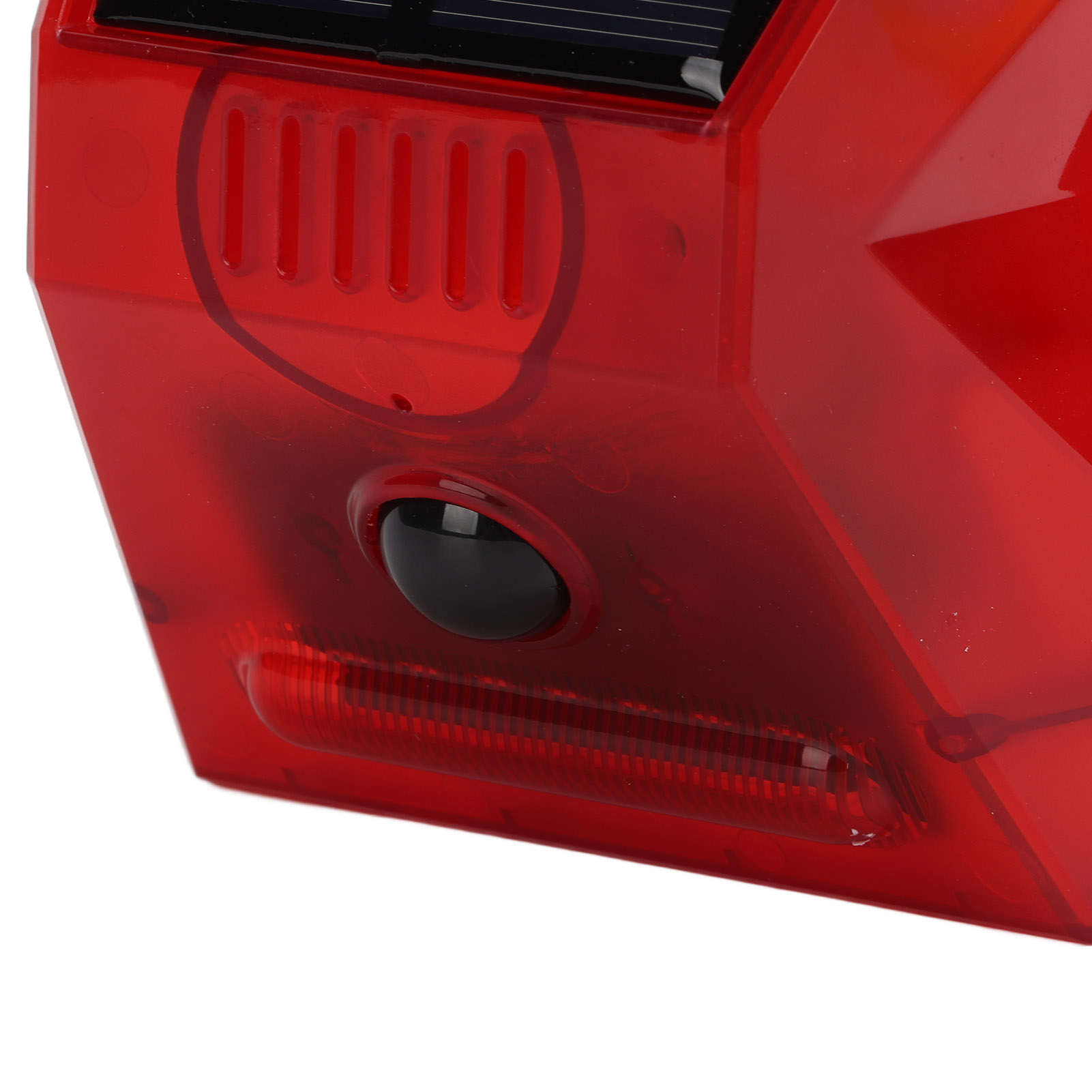 Ein rotes Licht mit einem schwarzen Sensor. Es hat ein Solarpanel.