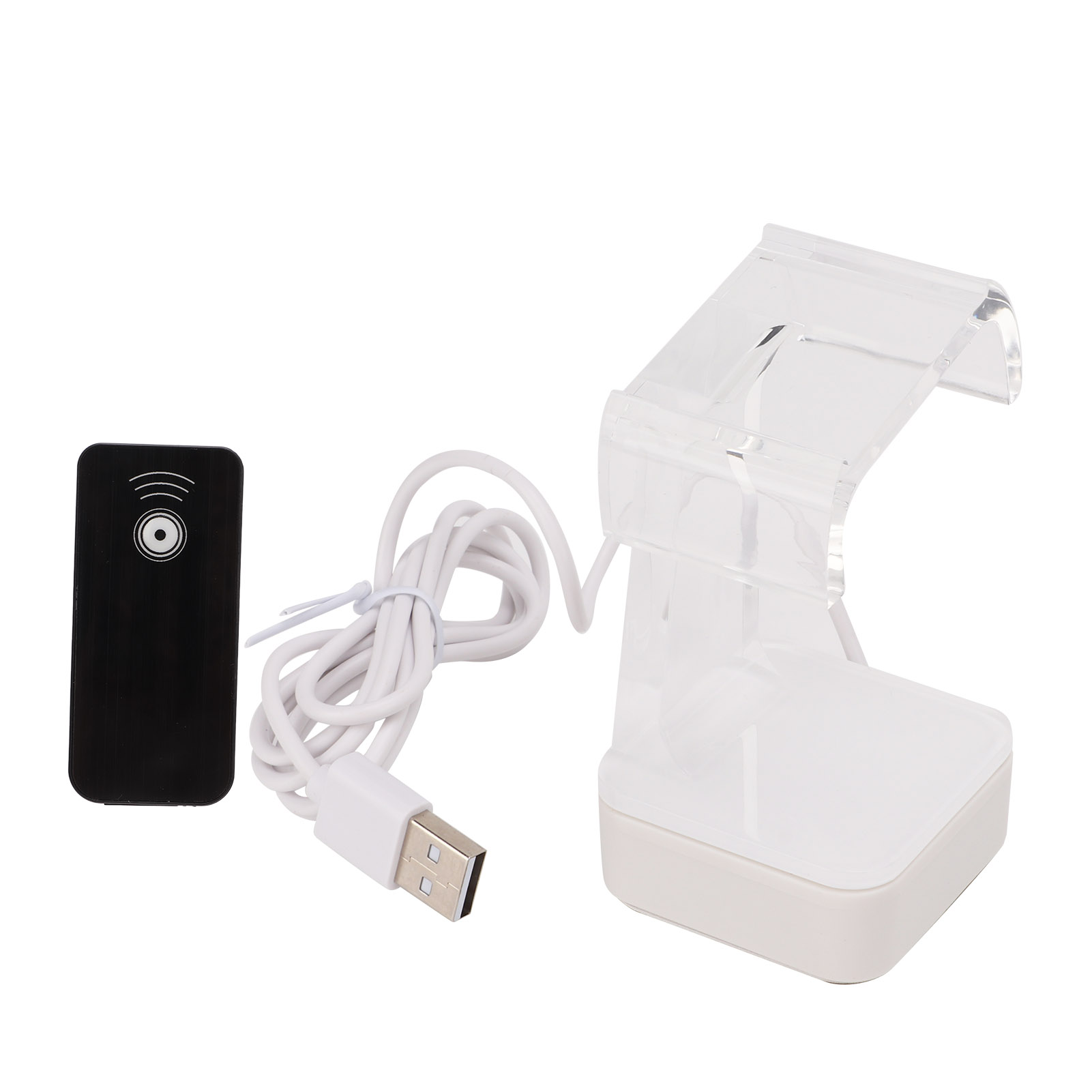 Eine Ladestation mit USB-Kabel und einer kleinen Fernbedienung.