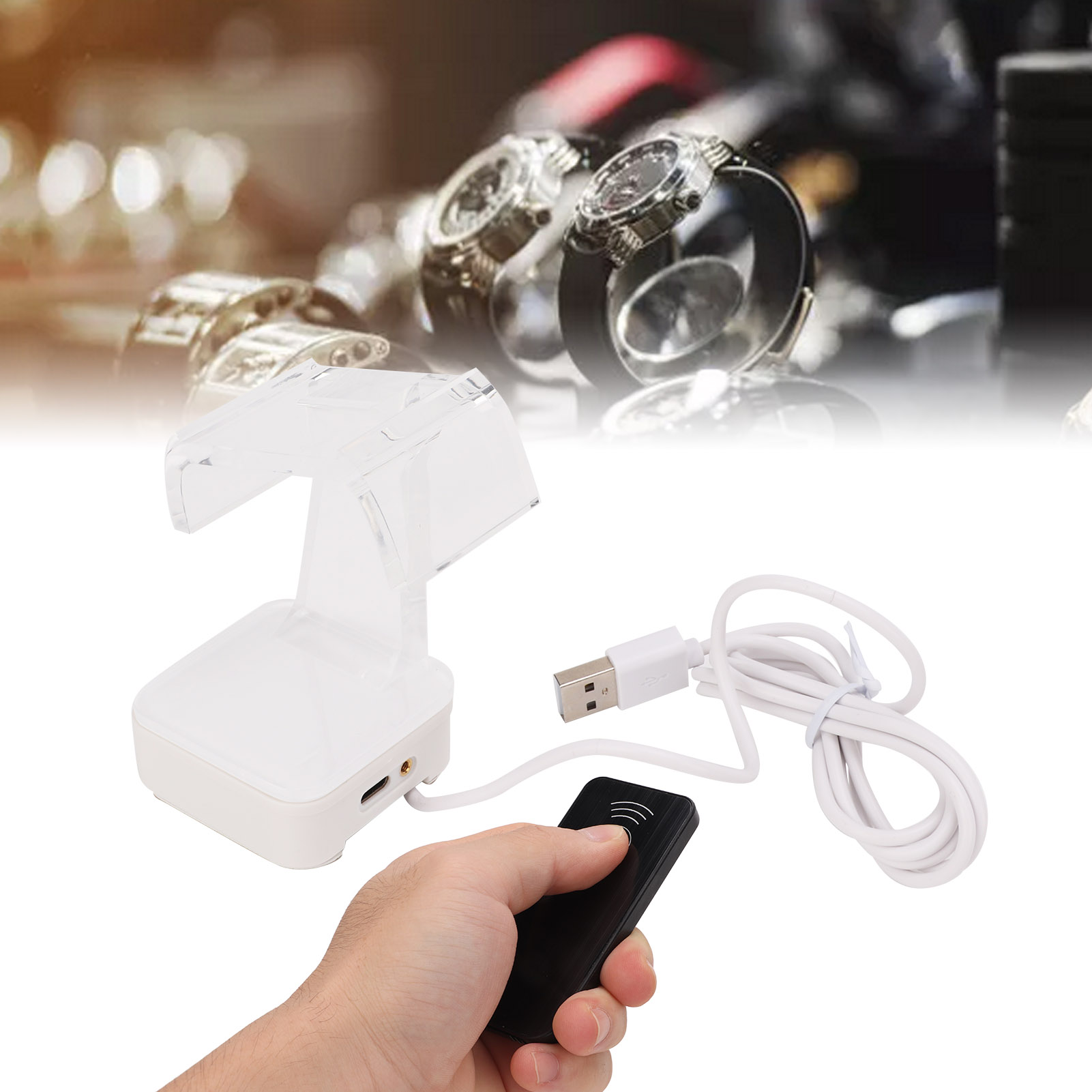Weißer Uhrenständer mit USB-Kabel und Fernbedienung.
