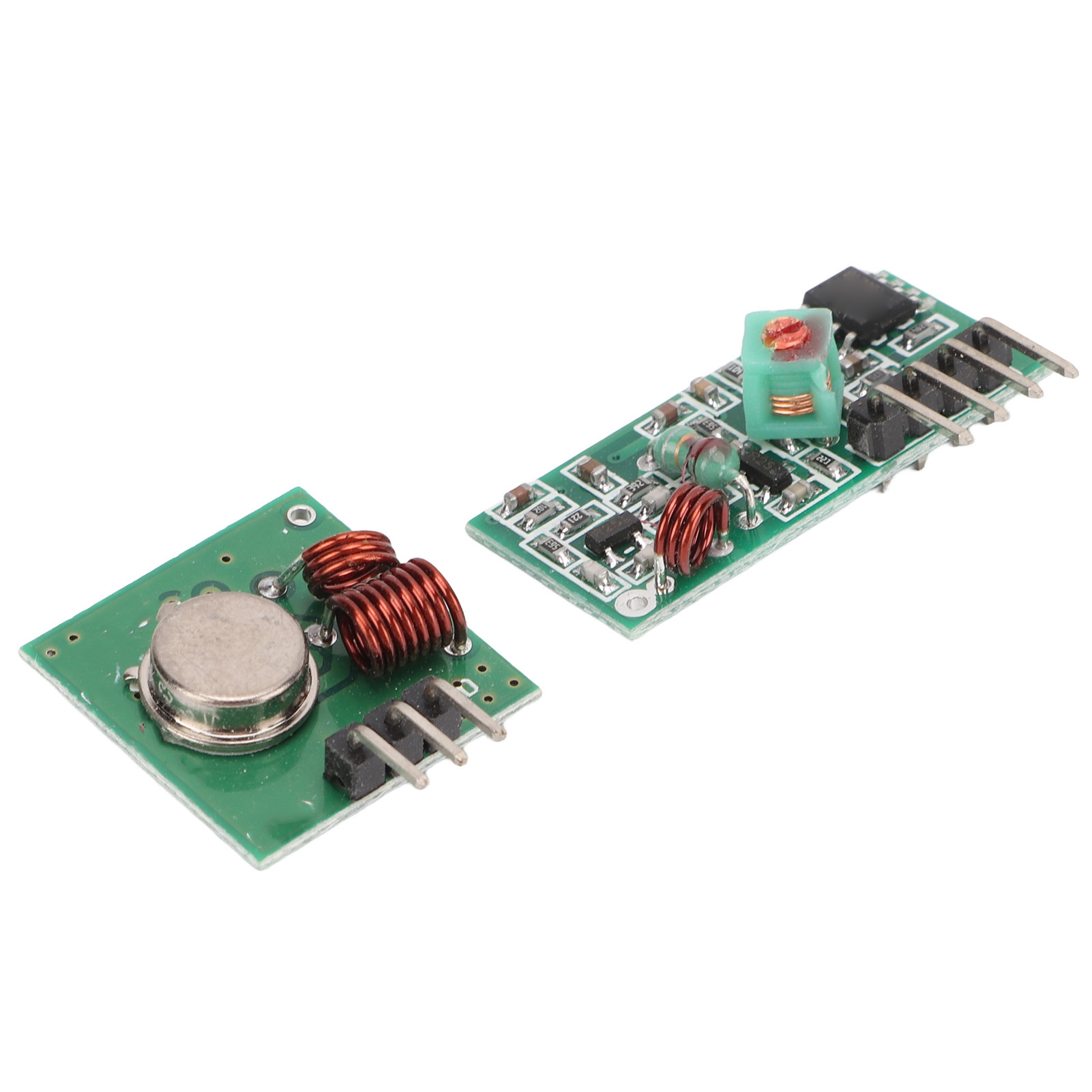 Zwei kleine grüne Leiterplatten mit elektronischen Bauteilen.