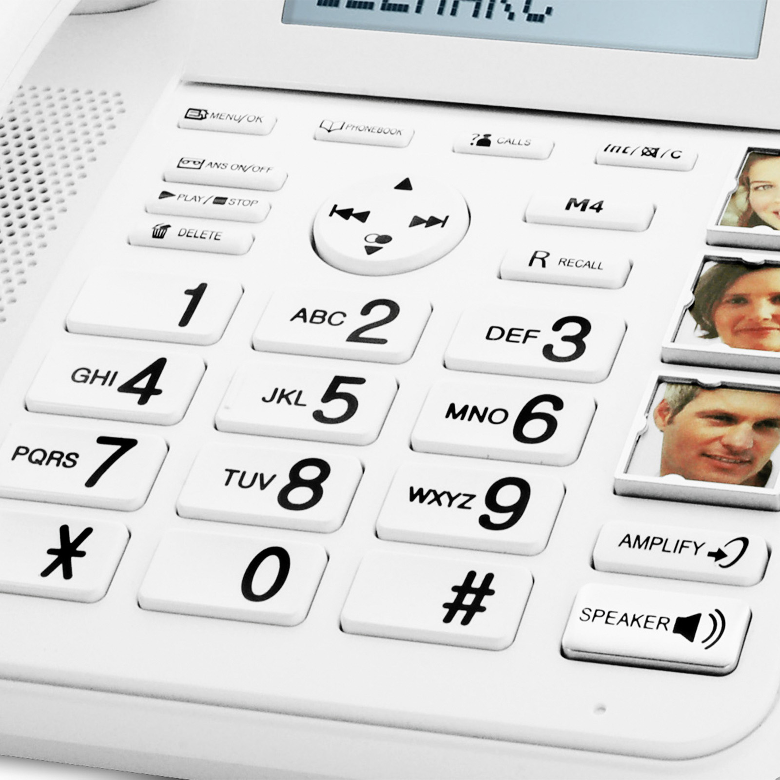 Telefono fisso bianco con pulsanti grandi e pulsanti di selezione rapida foto.