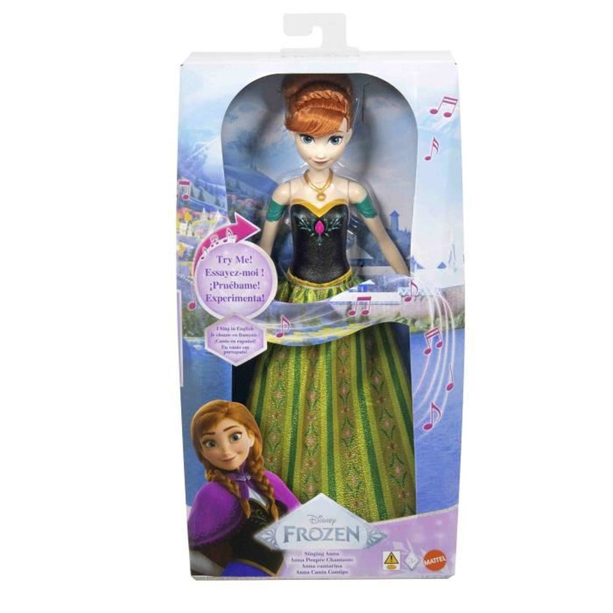 Una muñeca de Anna de Frozen en una caja. La caja tiene texto y notas musicales.