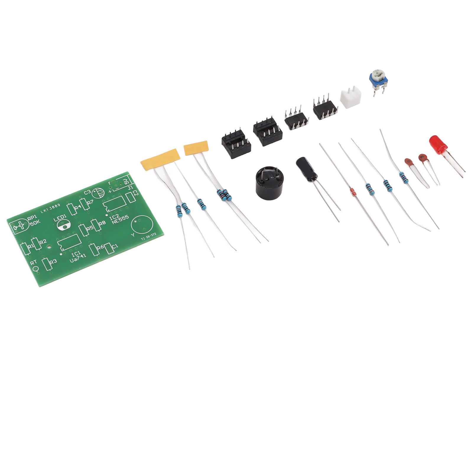 Elektronische Komponenten auf weißer Oberfläche. Komponenten umfassen Leiterplatte, Widerstände und LEDs.