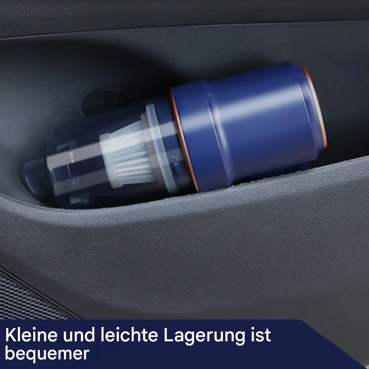 Tragbarer Staubsauger in einer Aufbewahrungstasche im Auto. Blaues Gerät, dunkelgrauer Innenraum.