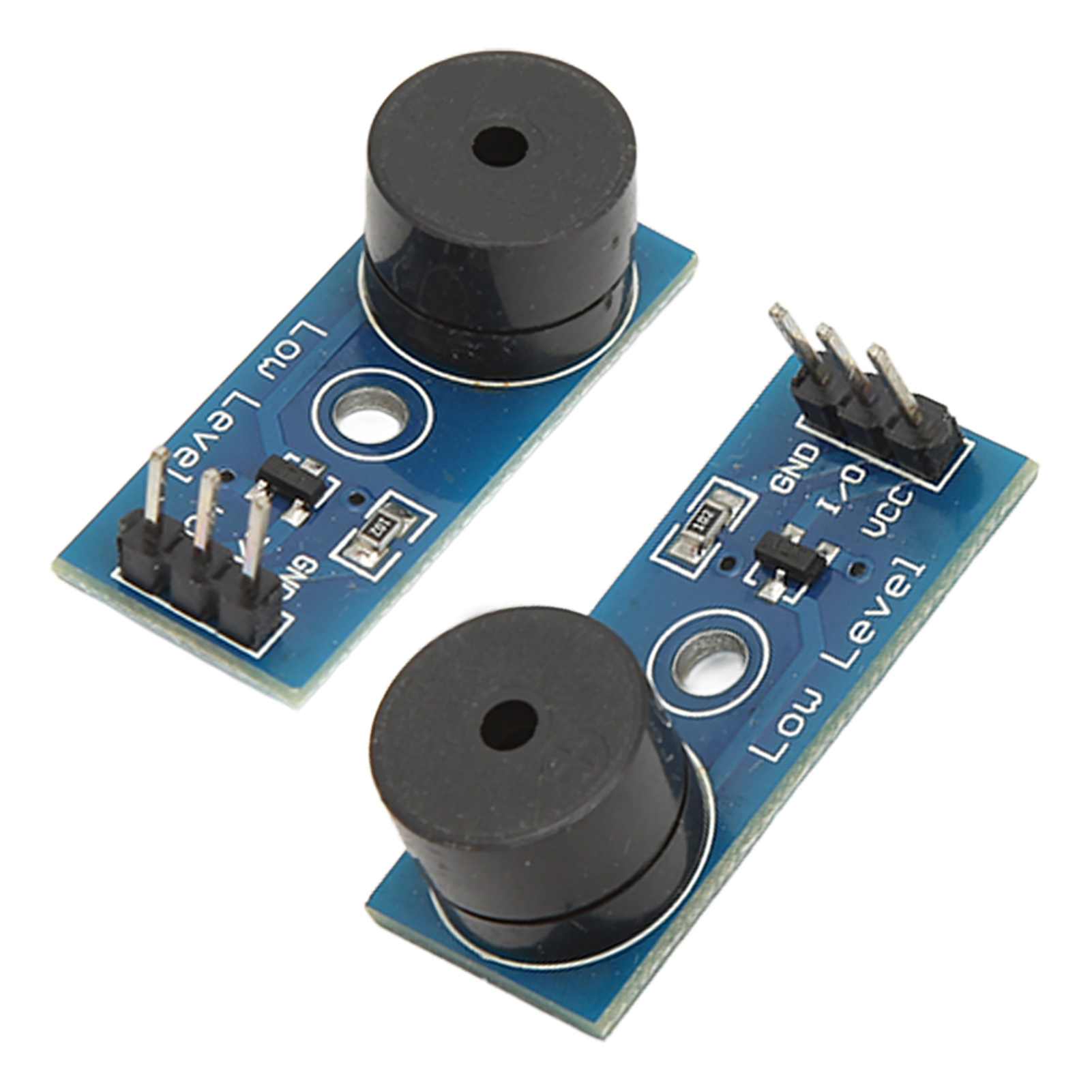 Zwei schwarze Summer auf einer blauen Leiterplatte mit elektronischen Bauteilen.