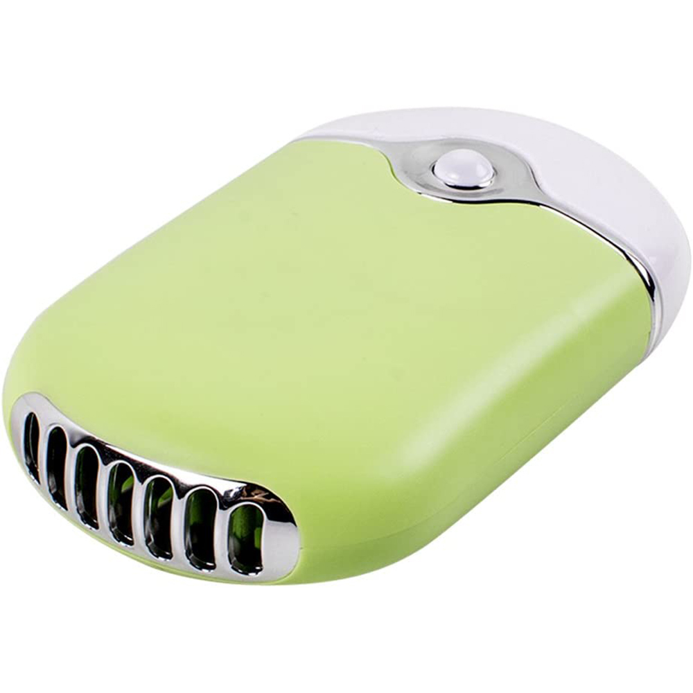 Ein grüner und weißer tragbarer Mini-Ventilator. Es hat einen Lüfter und einen Knopf oben.