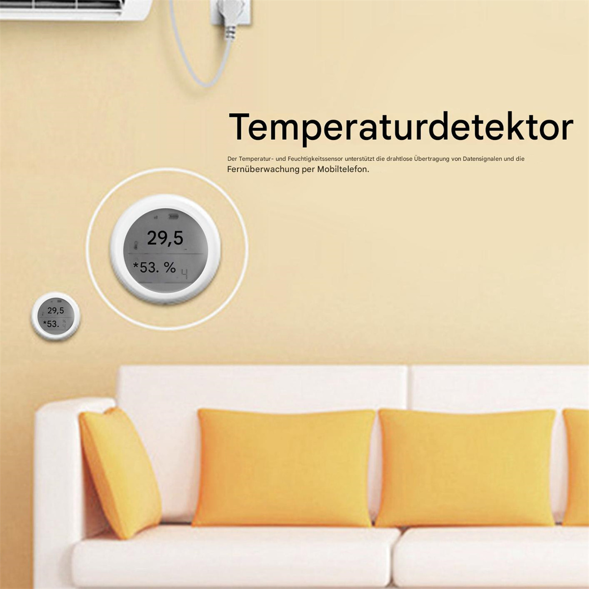 Eine Wand mit Temperaturdetektor und Sofa mit gelben Kissen.