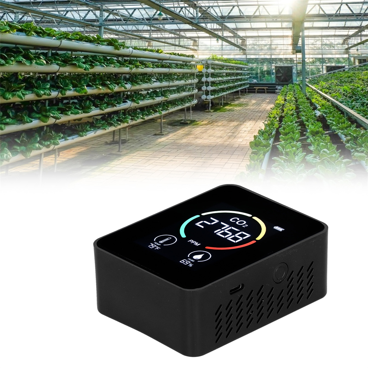 Schwarzer CO2-Sensor im Gewächshaus. Zeigt CO2-Gehalt, Temperatur und Feuchtigkeit.