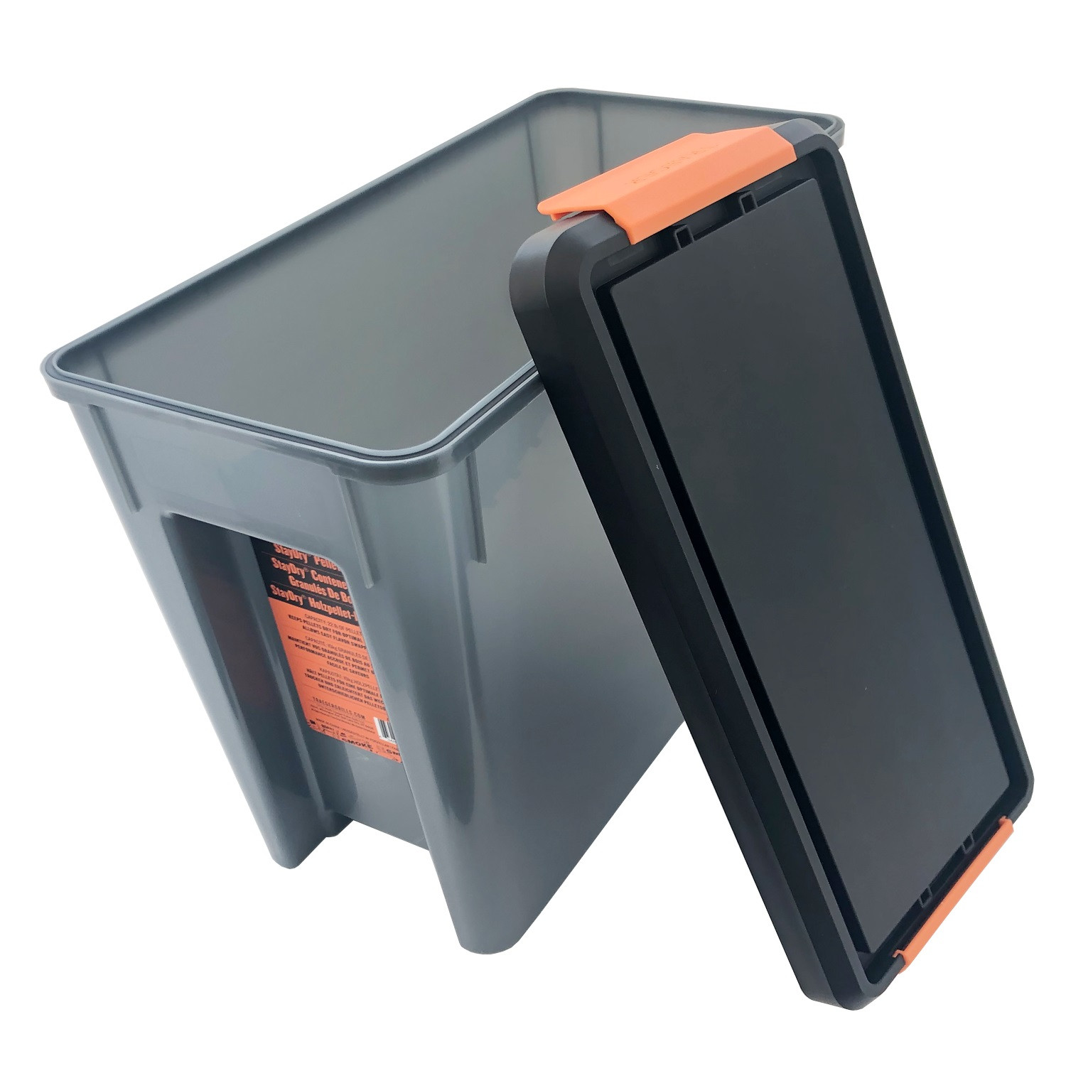 Cubeta de pintura rectangular gris con tapa negra abierta y asa naranja.