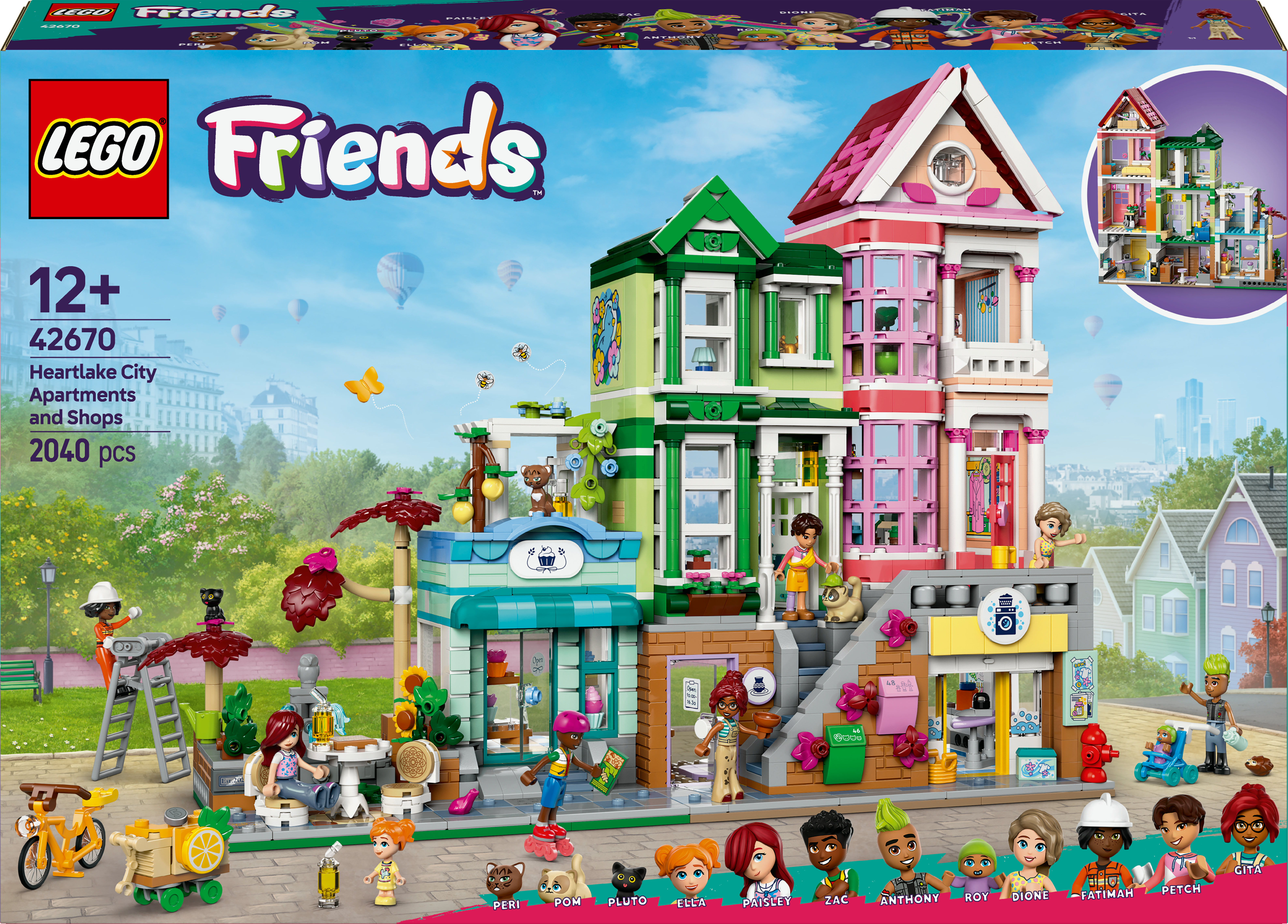 Un set Lego Friends con apartamentos y tiendas coloridas. Hay figuras presentes. La caja muestra el set.