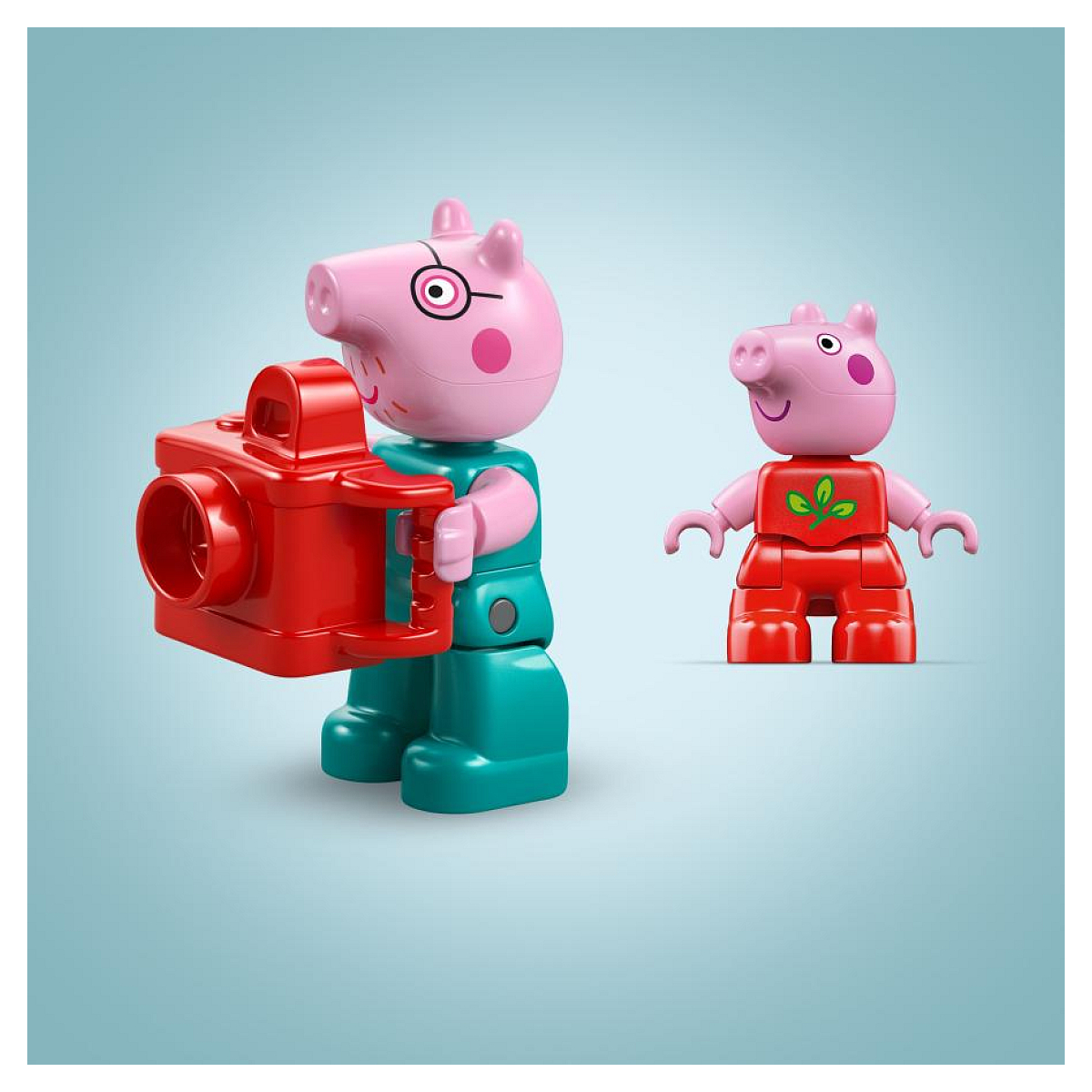 Dwie figurki Lego Peppy: jedna z aparatem, a druga w czerwonym stroju.