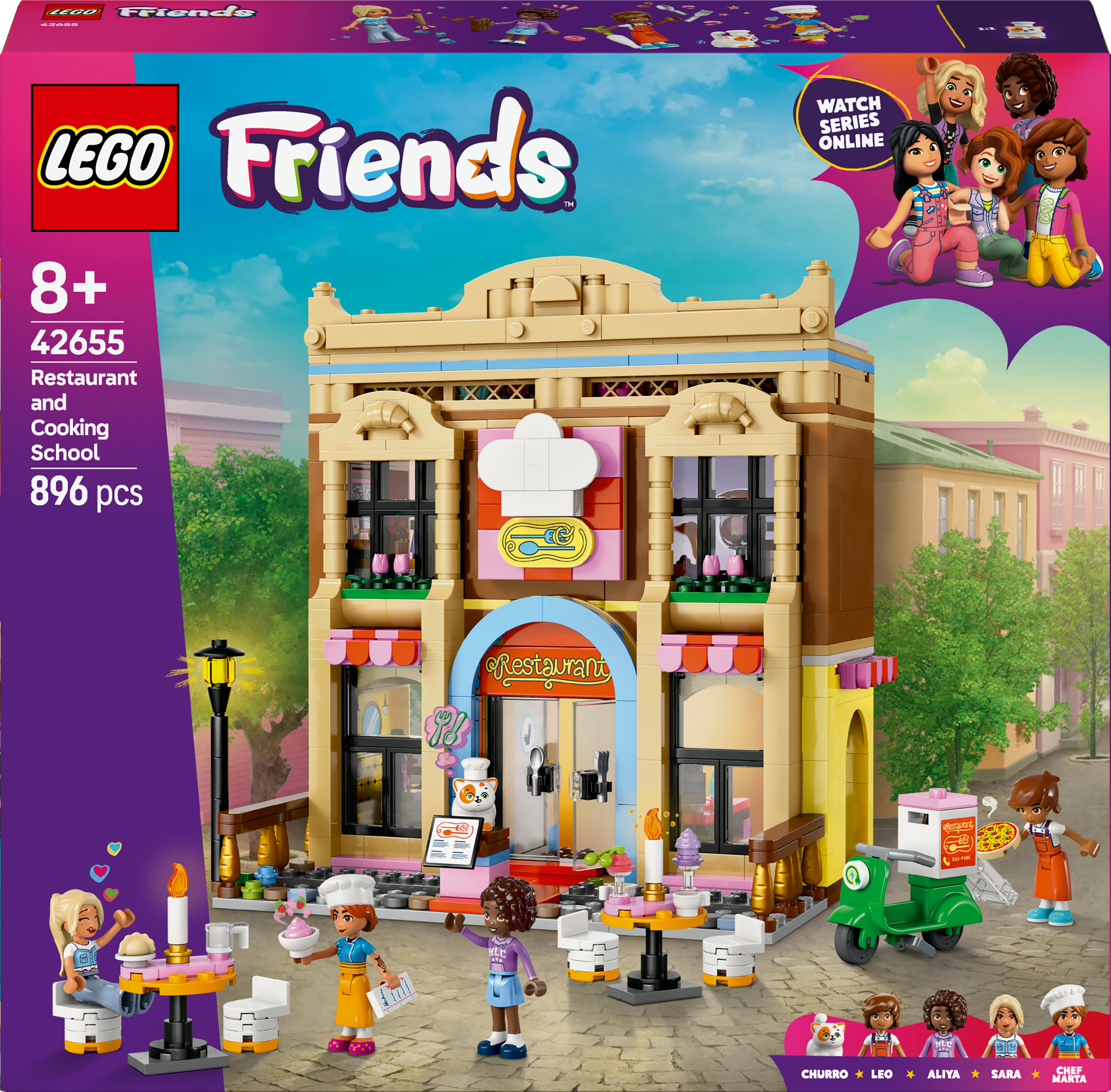 La caja del set de Lego Friends muestra un restaurante y una escuela de cocina. Figuras se muestran en la caja, y un edificio está en el medio.