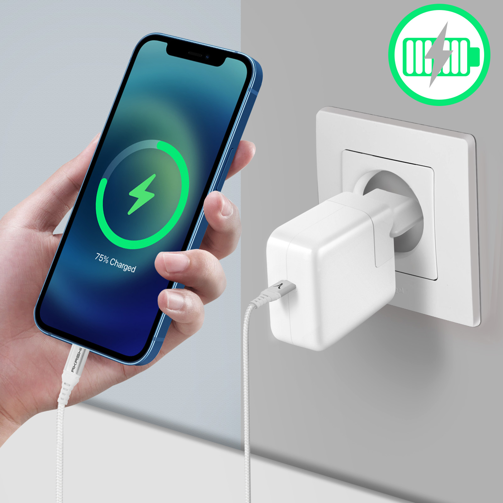 Téléphone en charge avec un câble blanc et un chargeur branché dans une prise murale.