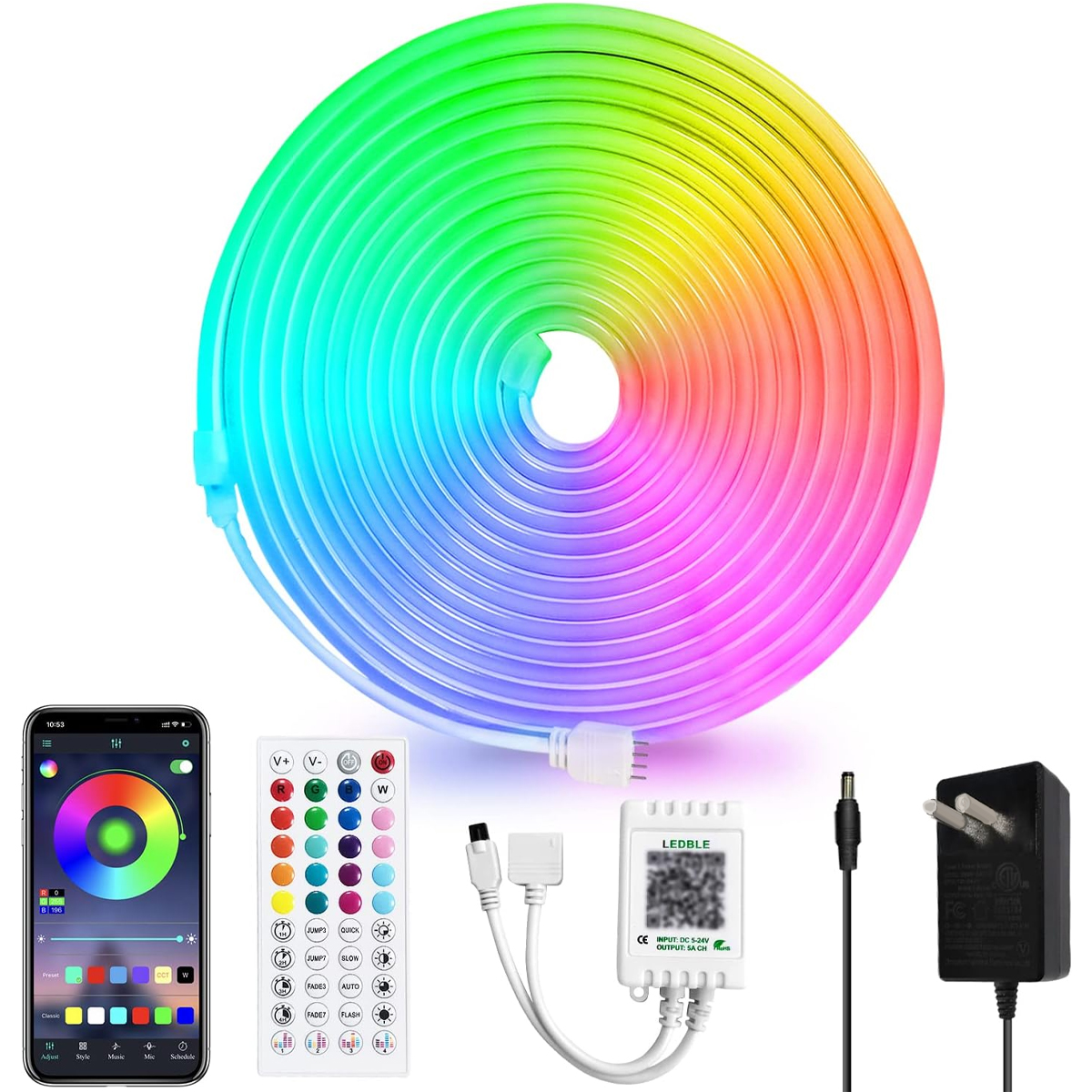 Eine Rolle farbenfroher LED-Streifen mit Zubehör wie Fernbedienung, Controller und Netzteil.
