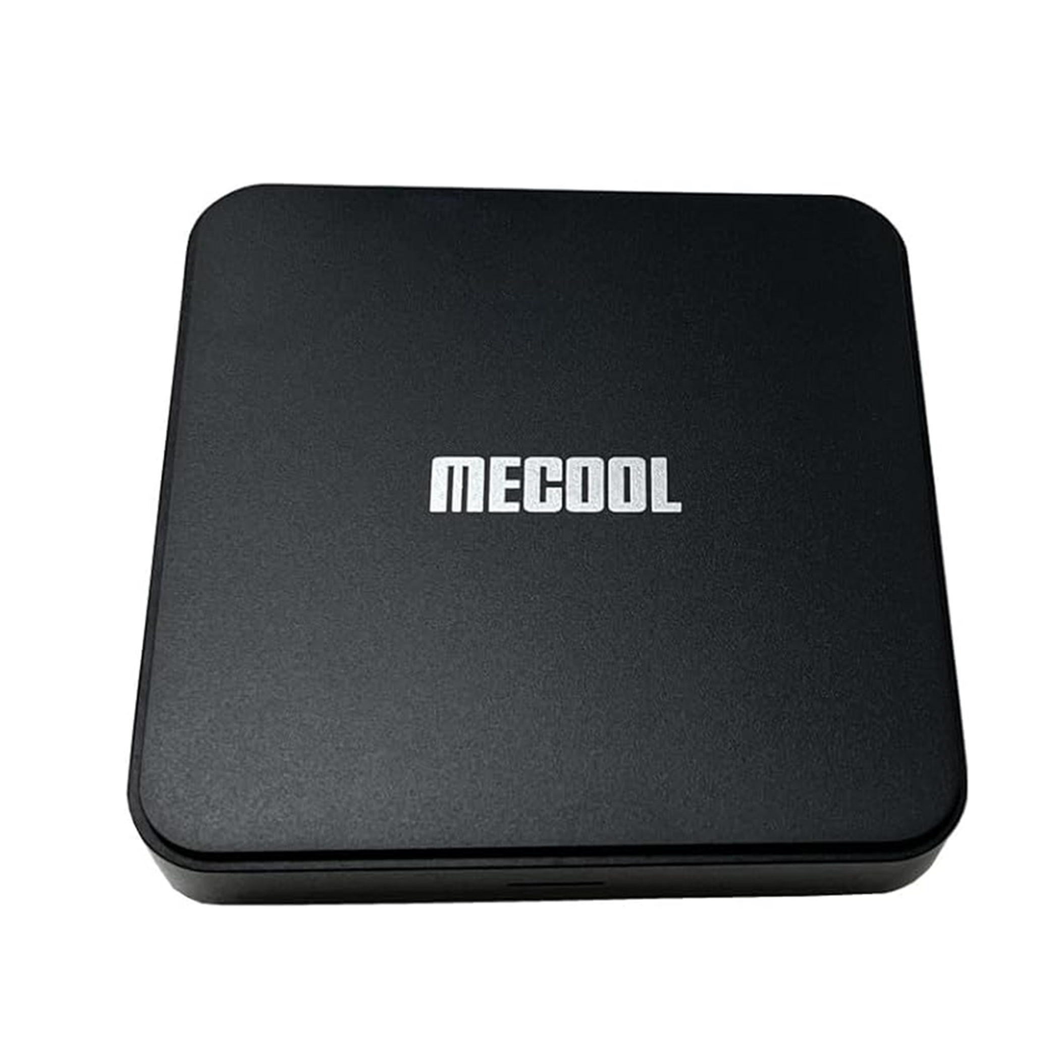 Czarny dekoder MECOOL z nazwą marki na froncie. Białe tło.