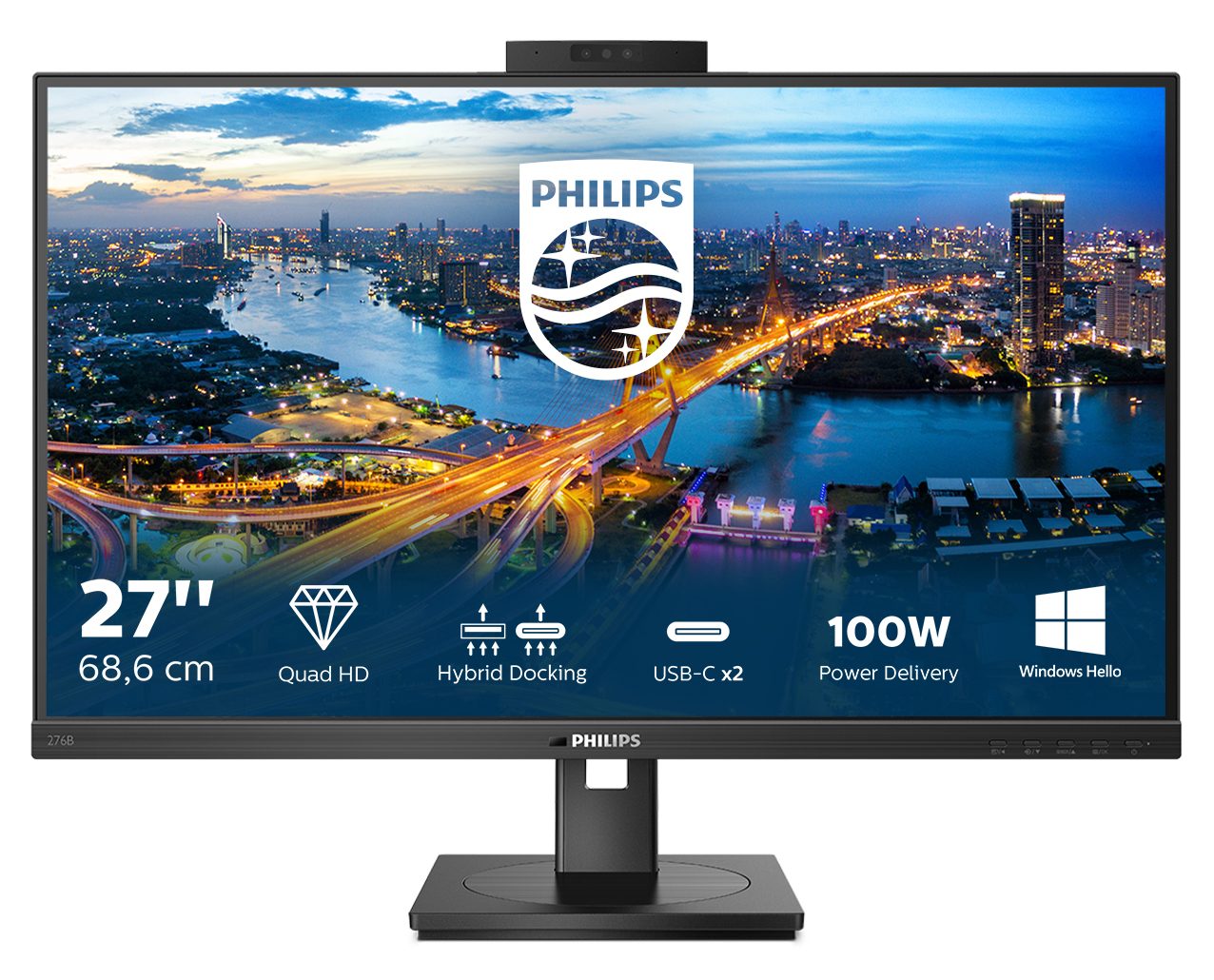 Monitor Philips wyświetlający nocny krajobraz miejski, z kamerą i logo nad ekranem.