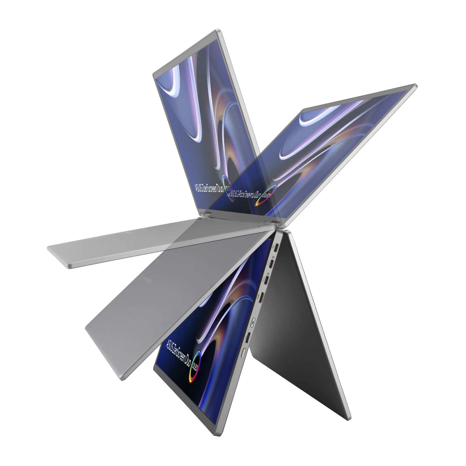 Srebrny laptop z trzema widocznymi ekranami. Każdy ekran wyświetla niebiesko-fioletowe tło.