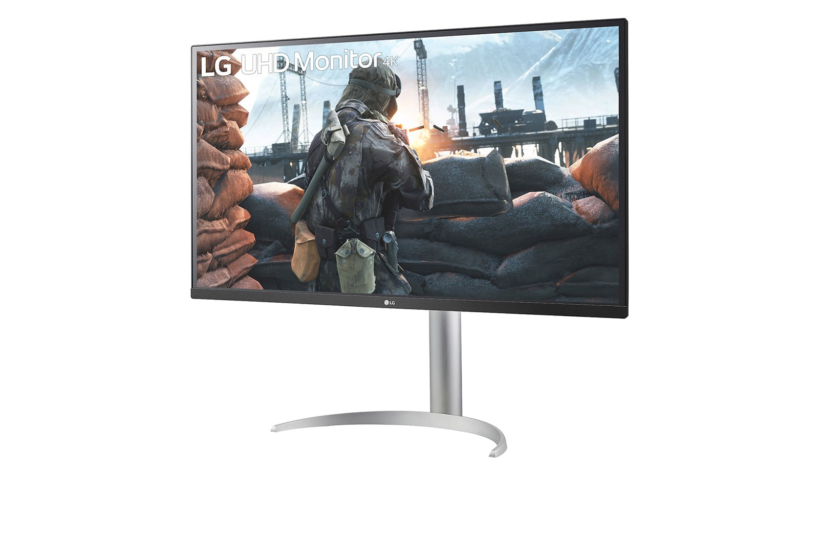LG UHD monitor displaying a video game scene, with a silver stand.