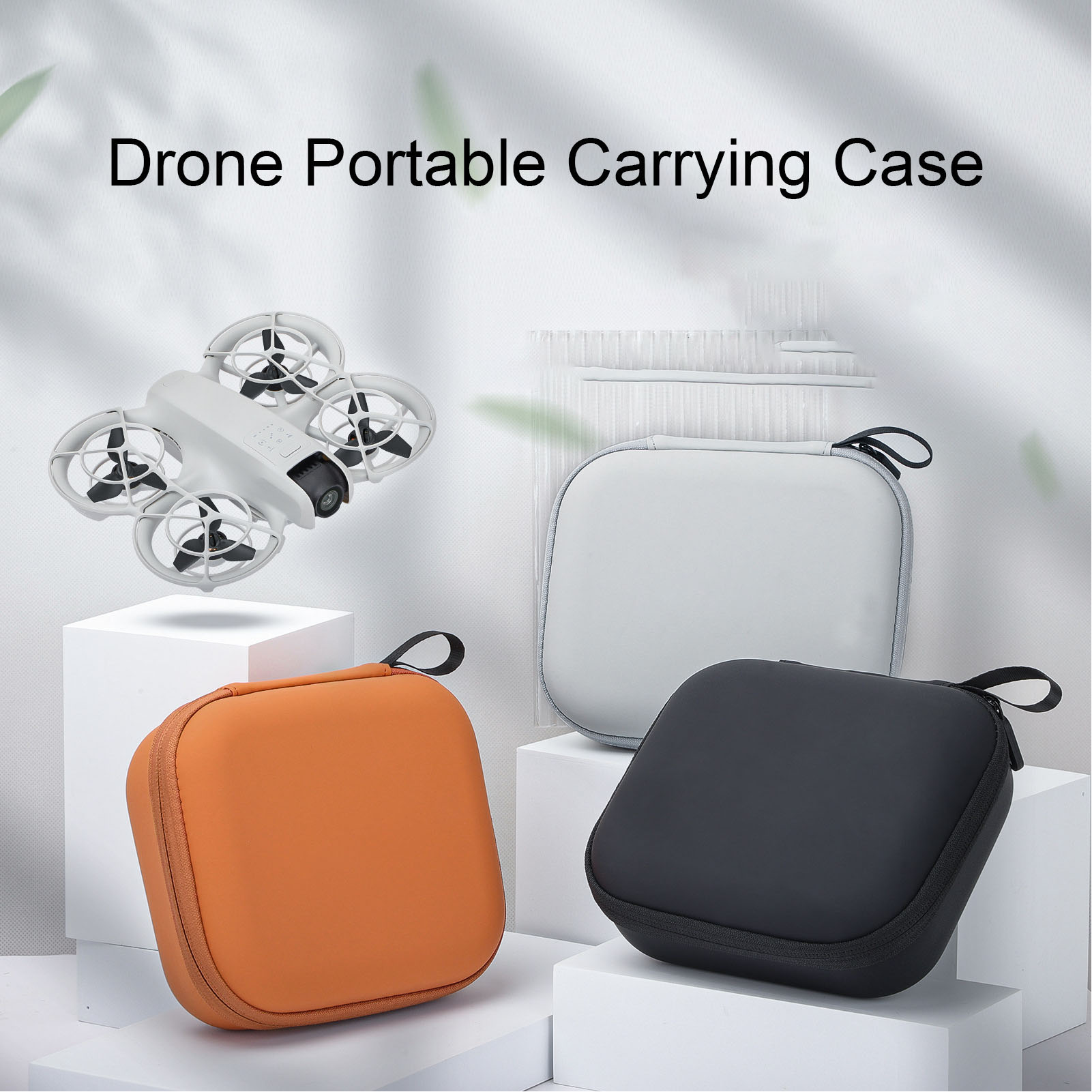 Drohne und Tragetaschen. Weiße Drohne, orange und schwarze Taschen und weißer Hintergrund.