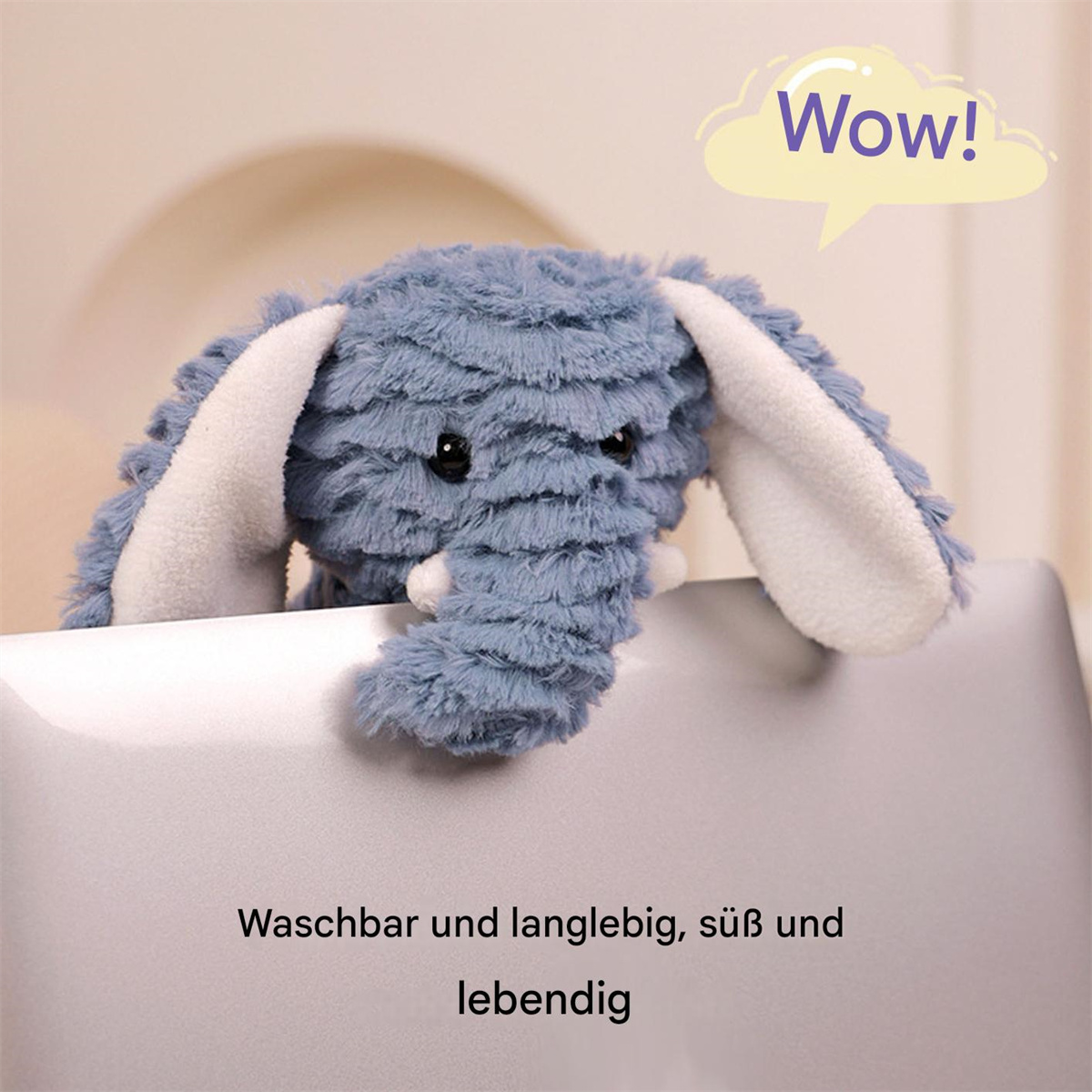 Blaues Plüsch-Elefanten-Spielzeug. Der Text sagt: 'Waschbar und langlebig, süß und lebendig'.
