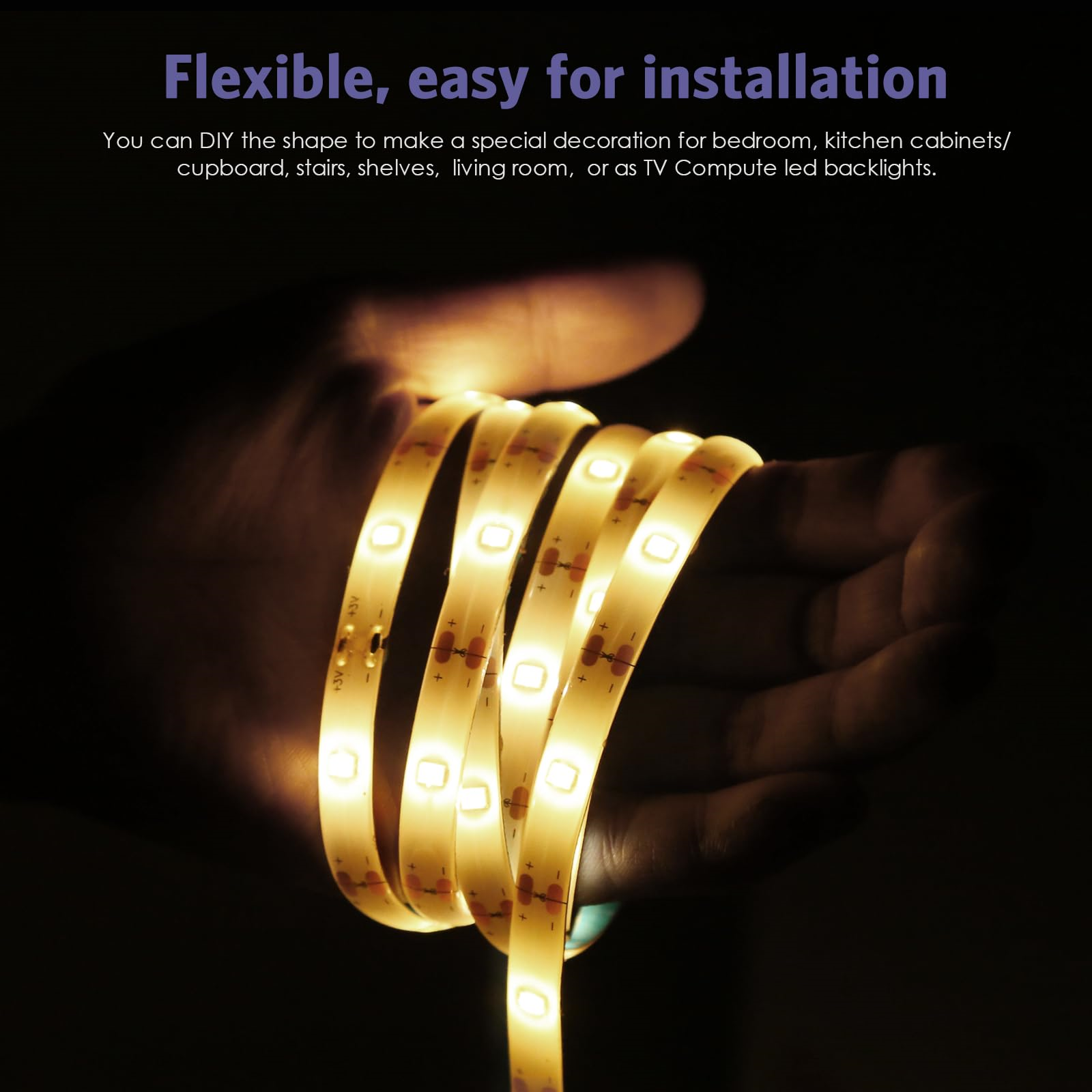 Eine Hand, die einen flexiblen LED-Streifen hält, der leuchtet, vor dunklem Hintergrund.