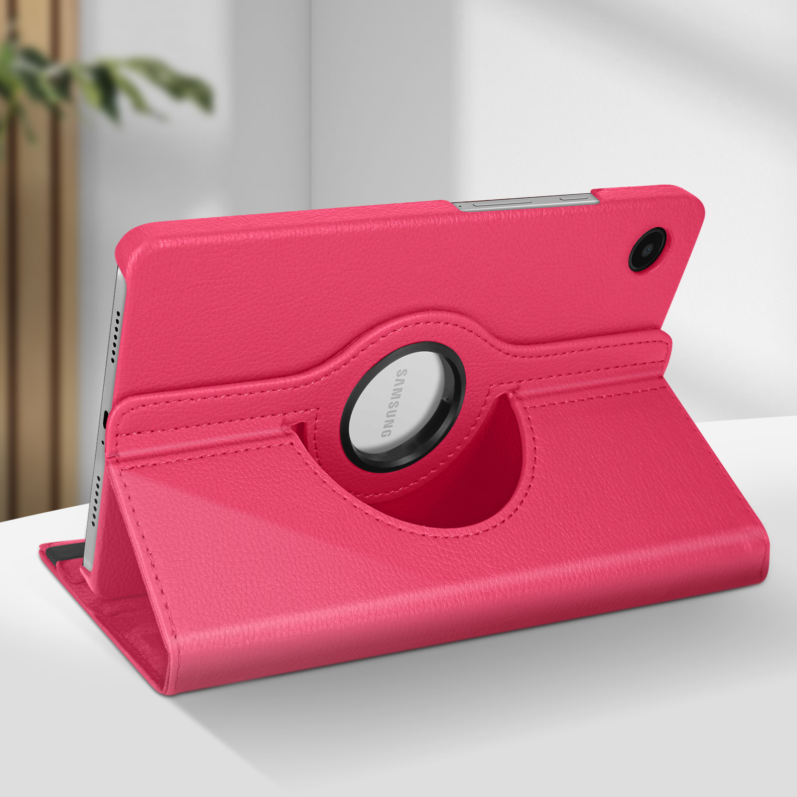 Custodia rosa per tablet, aperta, con tablet, sfondo bianco, studio.