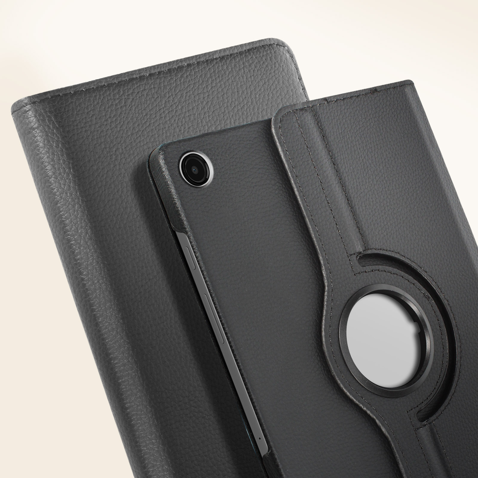 Un tablet nero è in una custodia di pelle grigia. La custodia ha un anello per tenerlo.