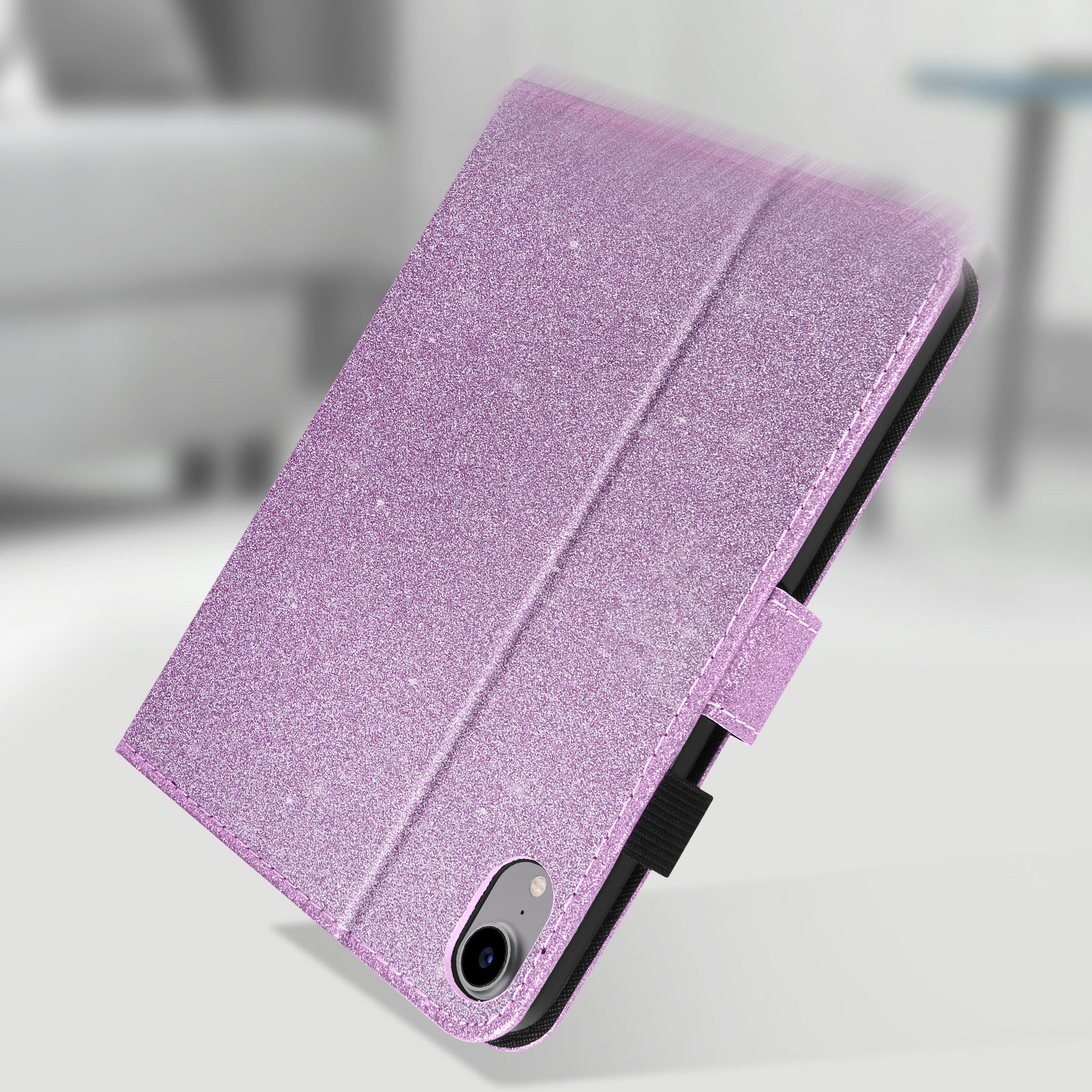 Custodia per tablet viola scintillante, chiusa. Interno nero, angolato su superficie bianca.