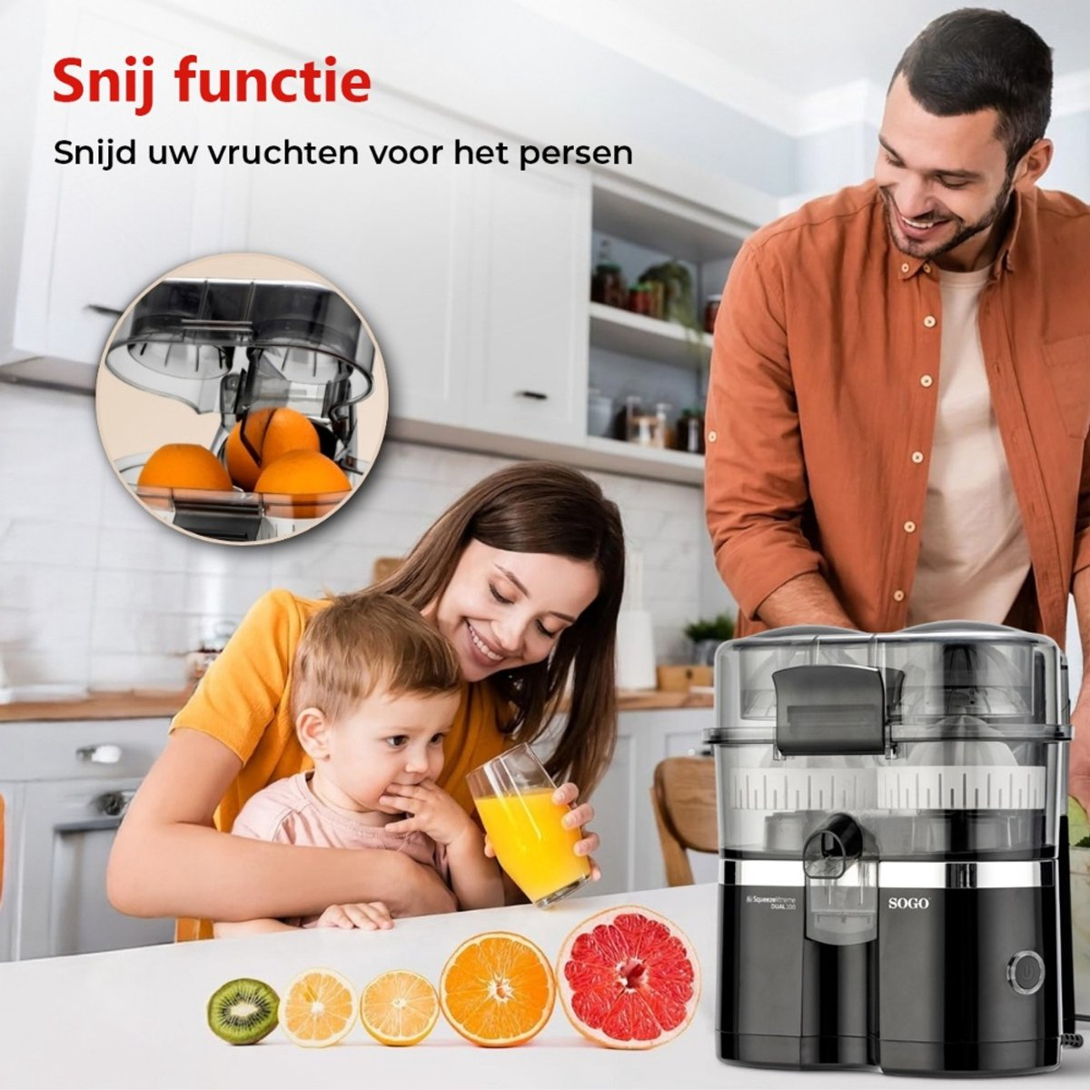 Familie, die Früchte entsaftet, mit einer Entsaftungsmaschine rechts. Verschiedene Früchte sind vorne.