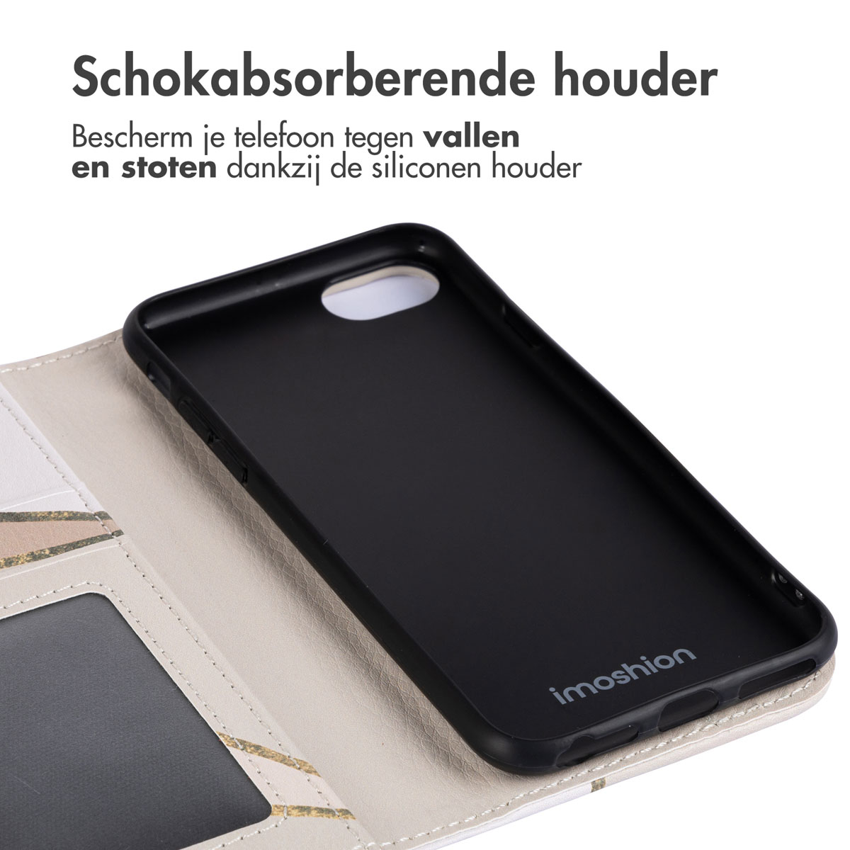 Zwarte telefoonhoes met imoshion-logo, op een crèmekleurige en goudkleurige portemonnee. Tekst: schokabsorberende houder.