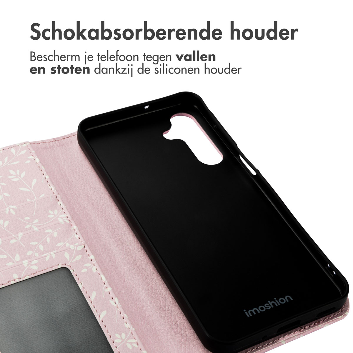 Zwarte telefoonhoes in een roze bloemenhoes. Detail van de binnenkant.