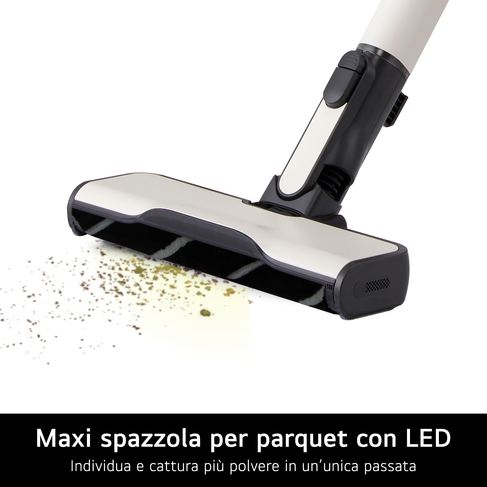 Una testina per aspirapolvere con design nero e argento, che espelle polvere su sfondo bianco.