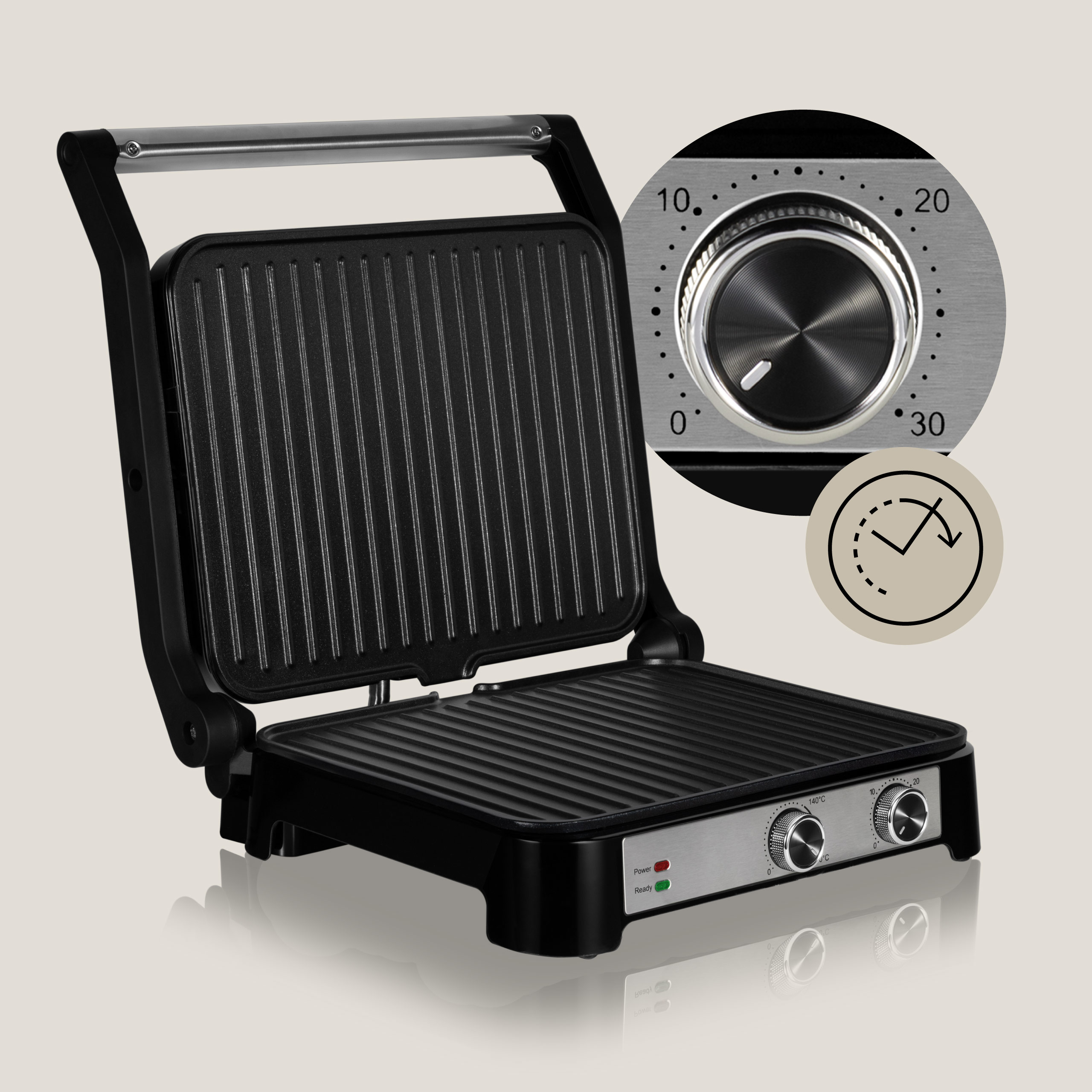 A black electric grill with controls and a timer dial.