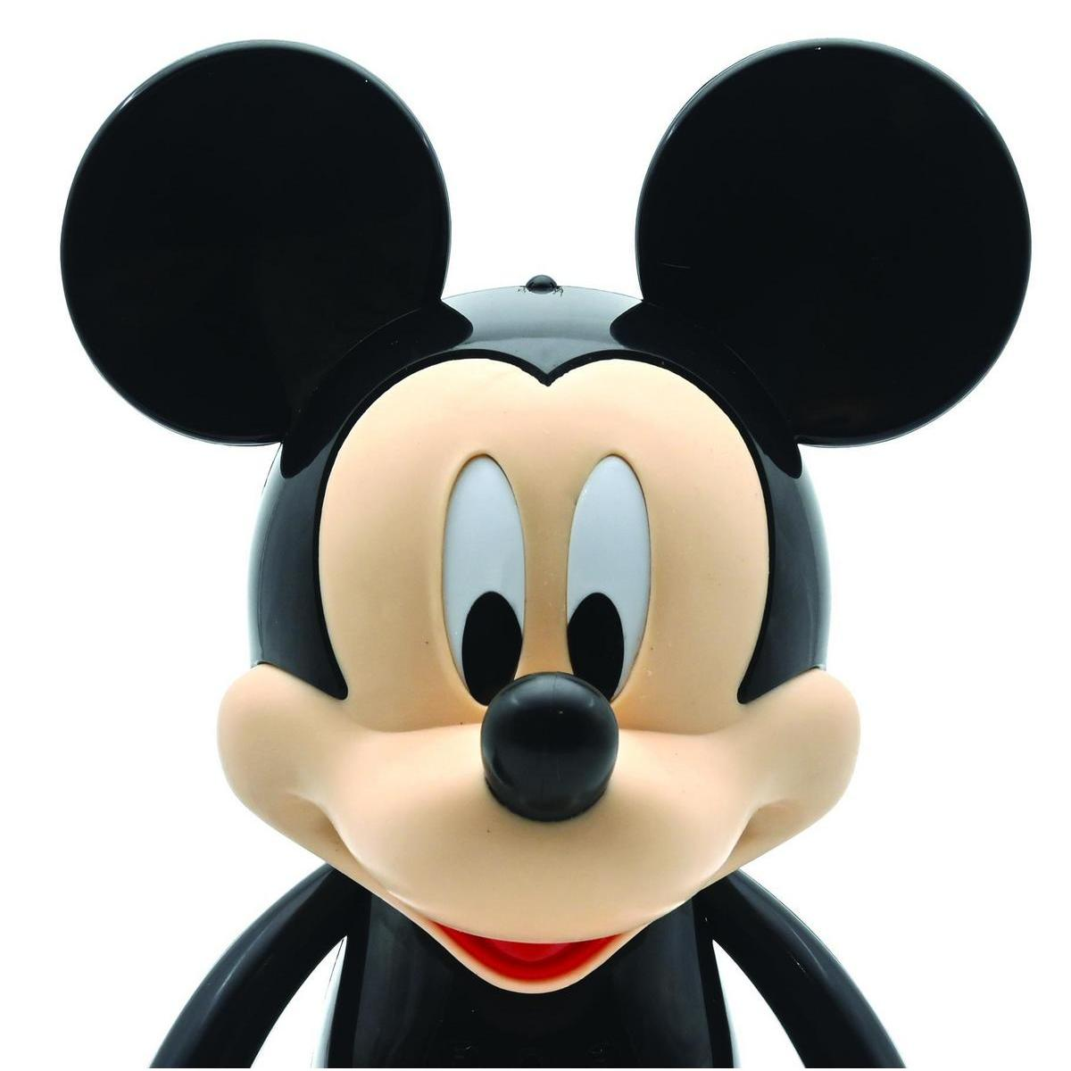 Testa di Topolino, orecchie e viso neri, con viso color crema e bocca rossa.