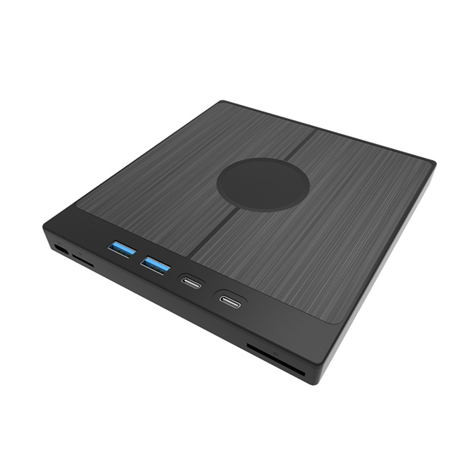 Ein schwarzes, quadratisches Gerät mit USB- und USB-C-Anschlüssen. Es hat einen kreisförmigen, strukturierten Mittelteil.