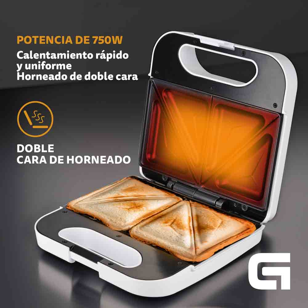 Sandwichera con sándwiches dentro. Caliente y brillante, abierta para mostrar la comida.