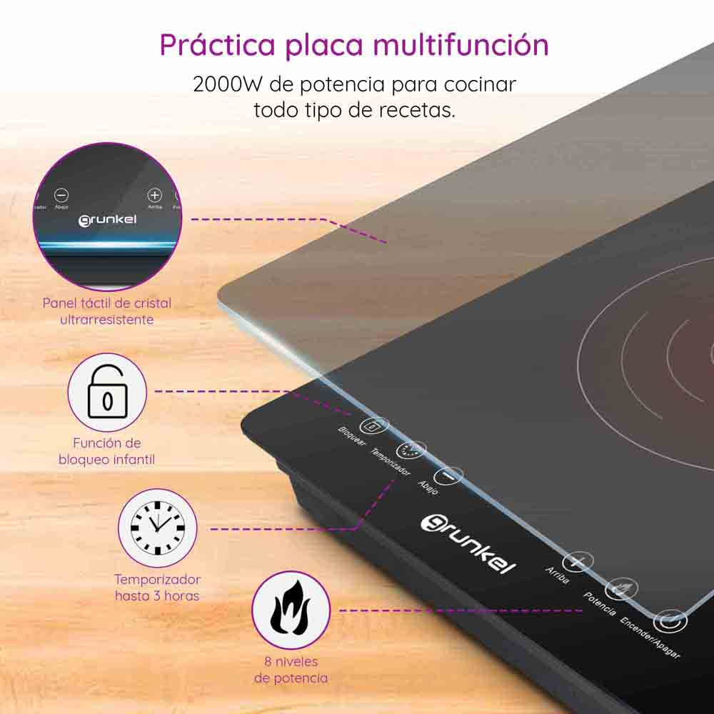 Primo piano di un piano cottura a induzione nero con comandi touch e icona di blocco di sicurezza.