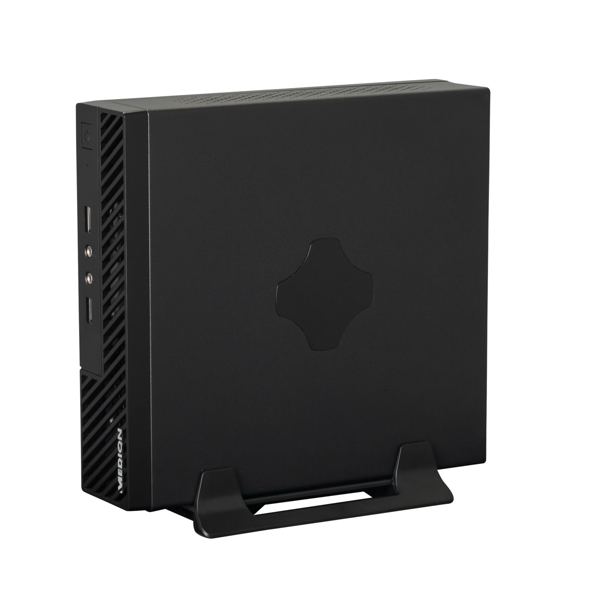 Un mini PC nero, con porte e un supporto. Il logo Medion è sul lato.
