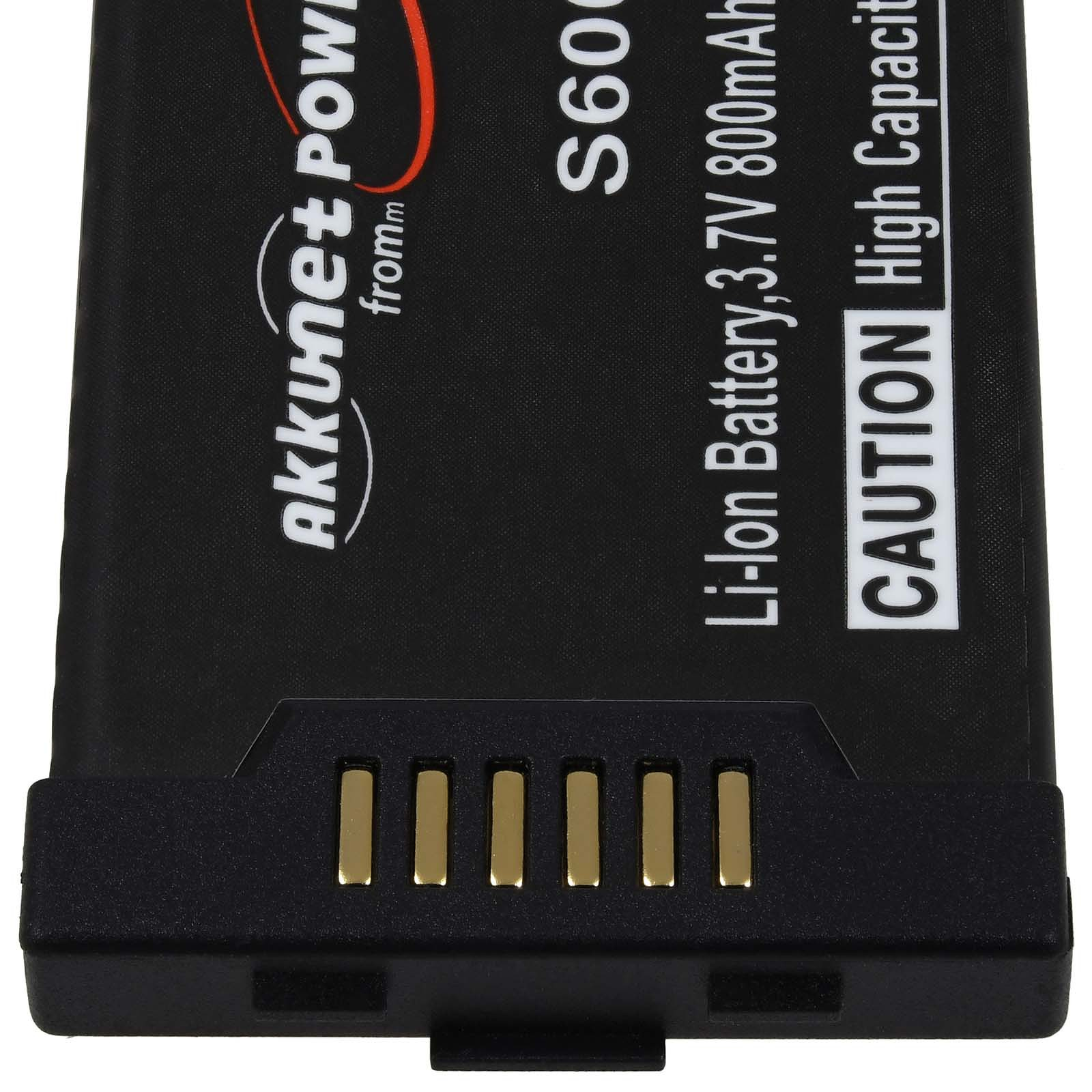 Una batería rectangular negra con contactos dorados y texto que dice Precaución Alta Capacidad.