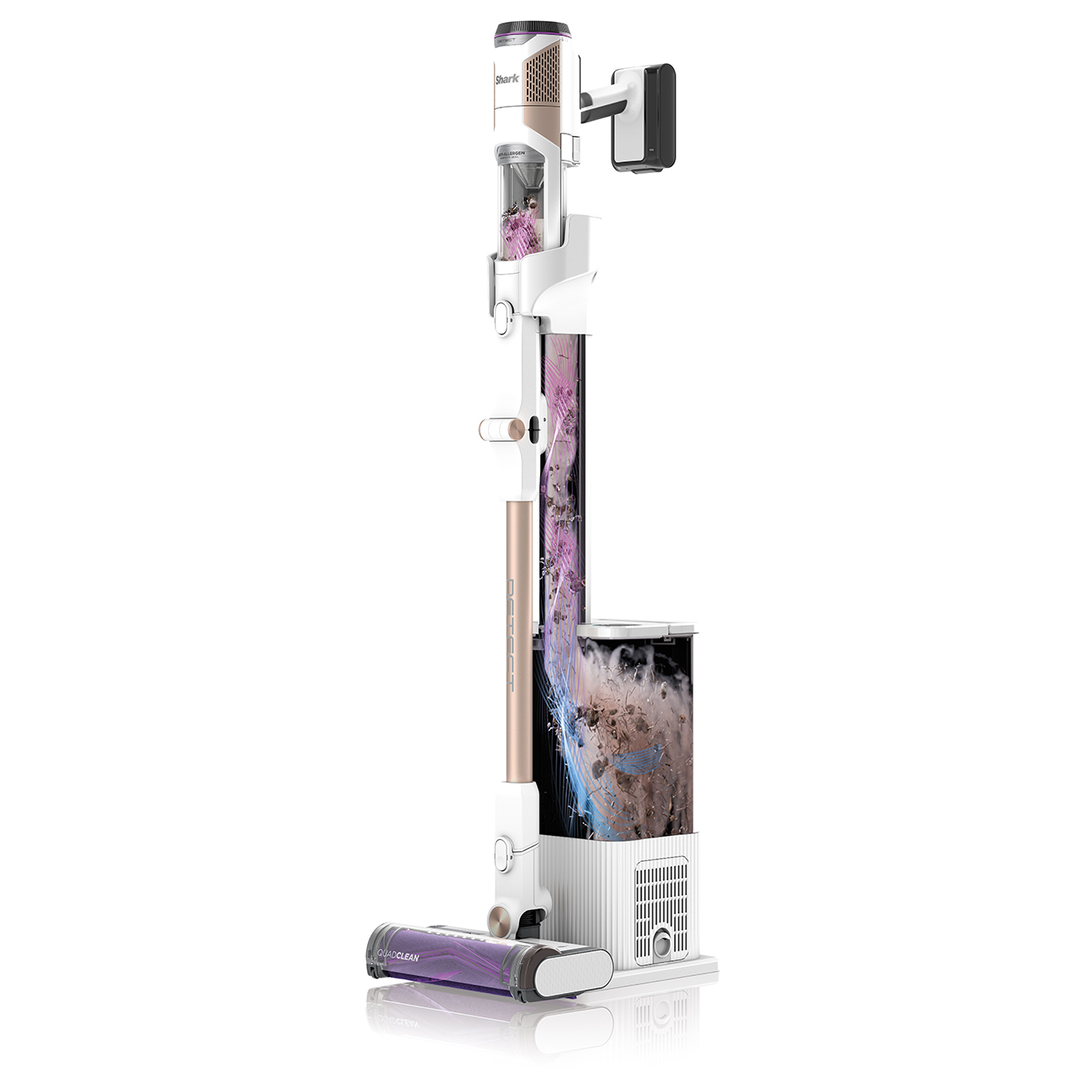 White and gold vacuum cleaner on a white surface. Interior section is visible, showing debris.