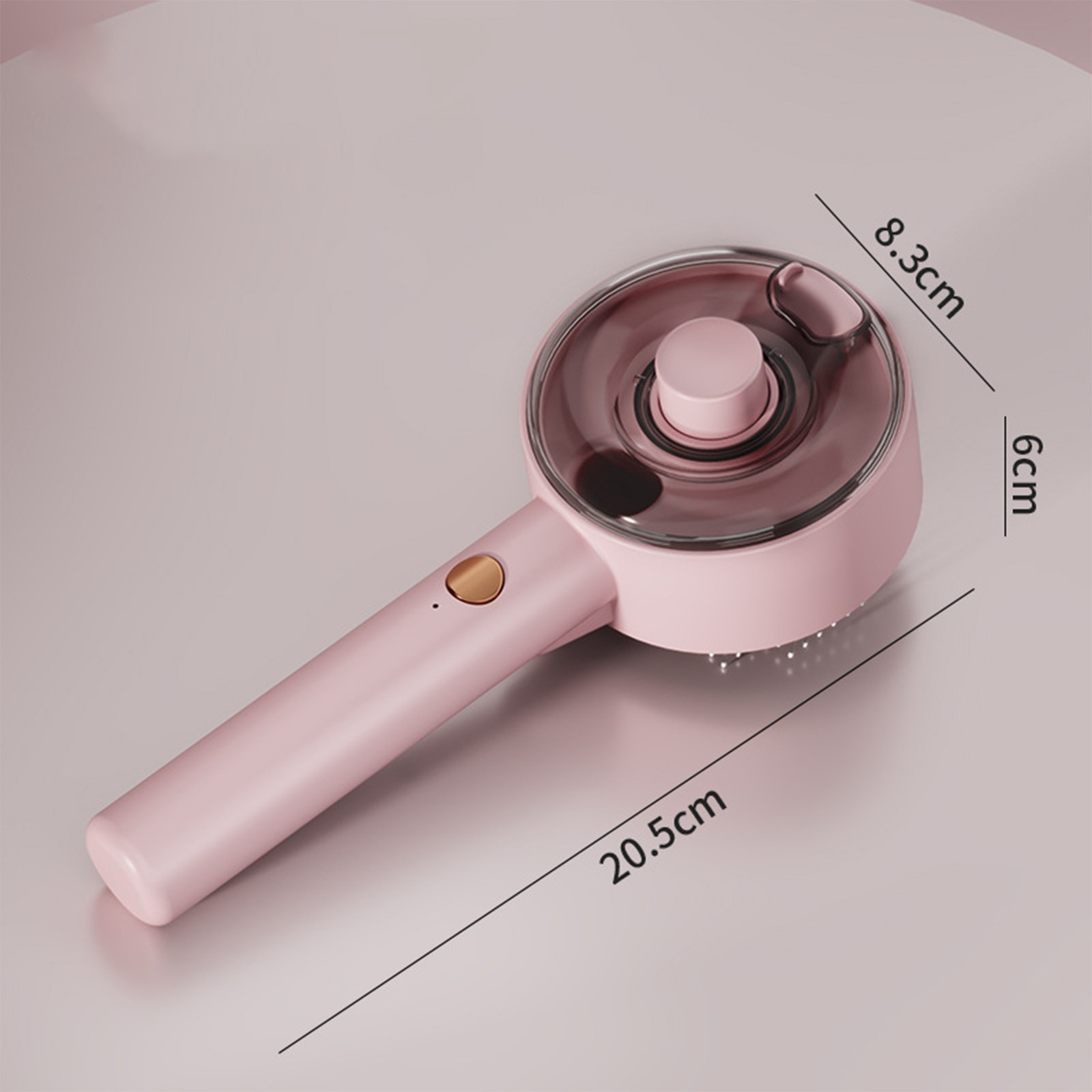Rosa Haustierbürste mit langem Griff. Die Bürste hat eine transparente Oberseite mit einem Knopf und ist 20,5 cm lang.
