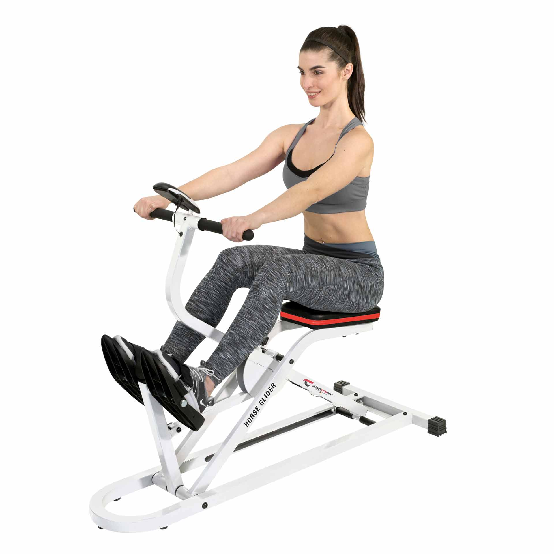 Frau auf einer Horse Glider Maschine. Sie trägt Sportkleidung. Weißer Hintergrund.
